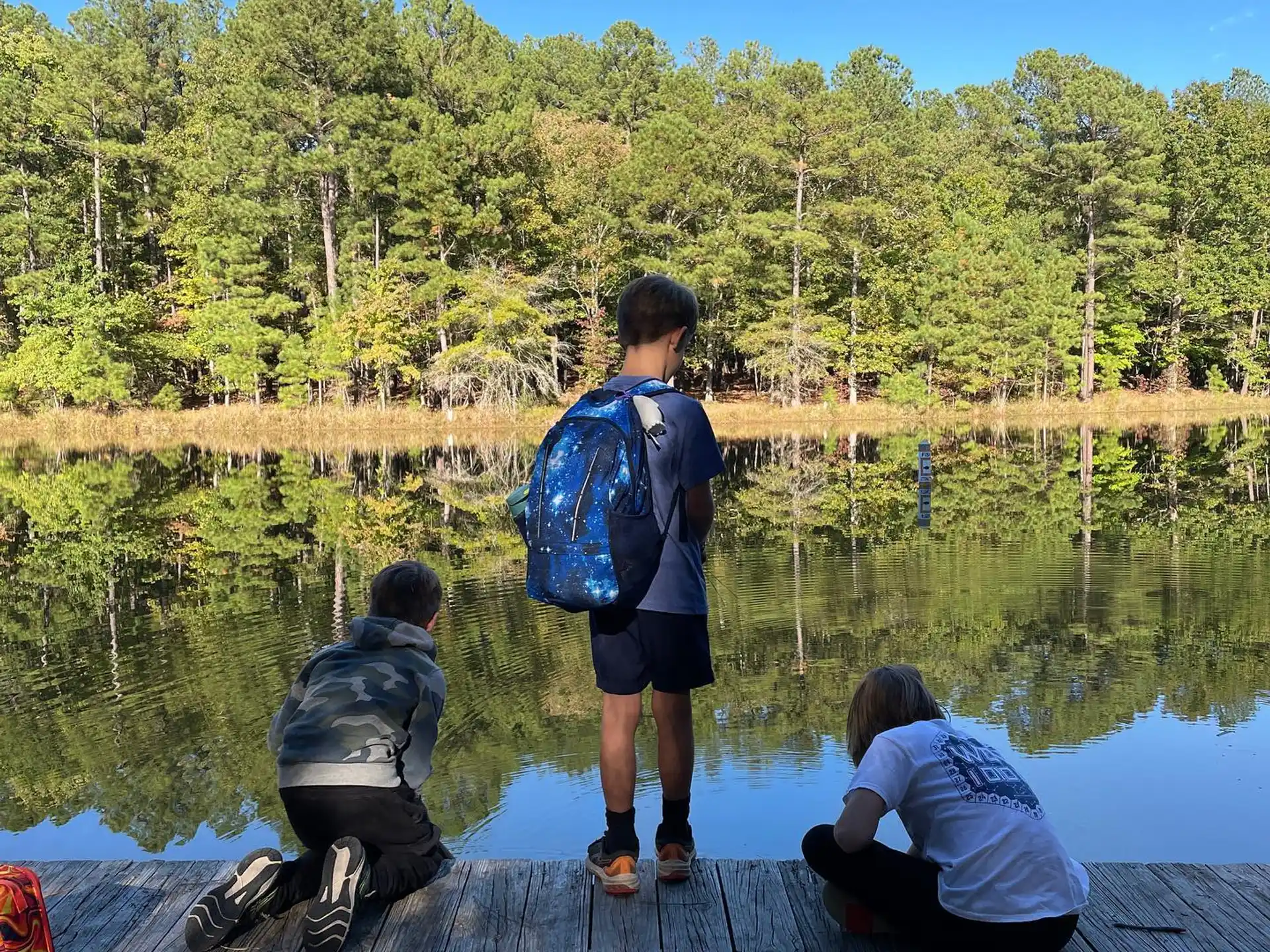 a group of people on a dock