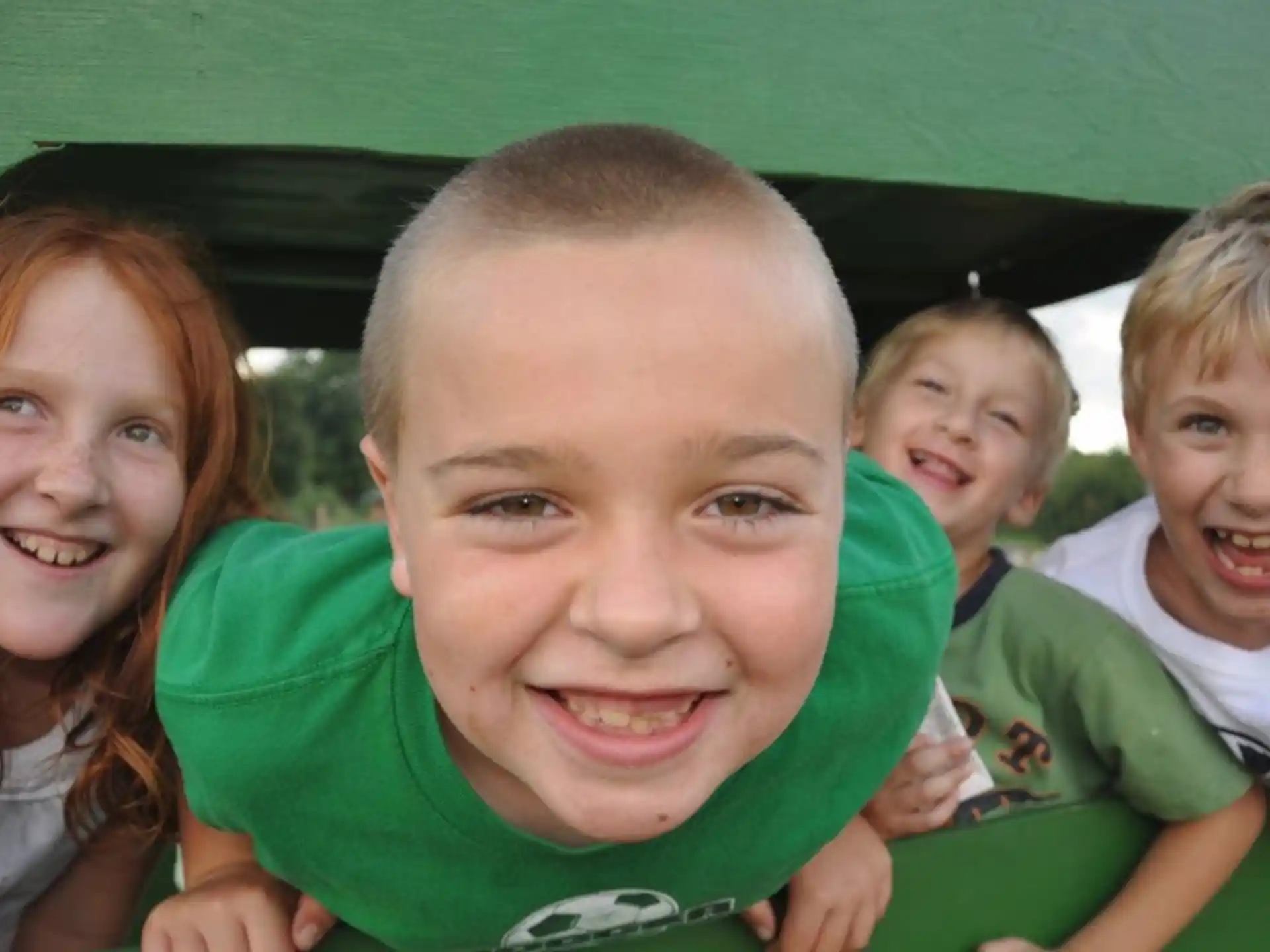 a group of children smiling