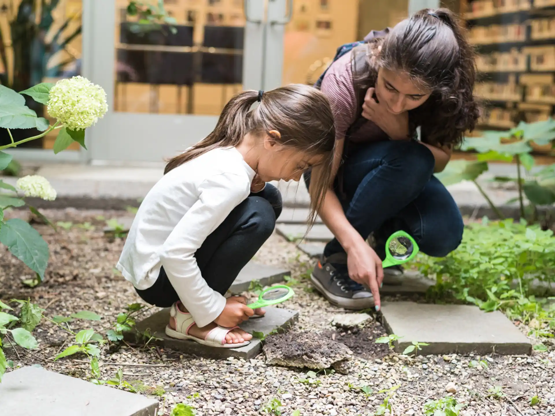 a couple of girls playing in the garden