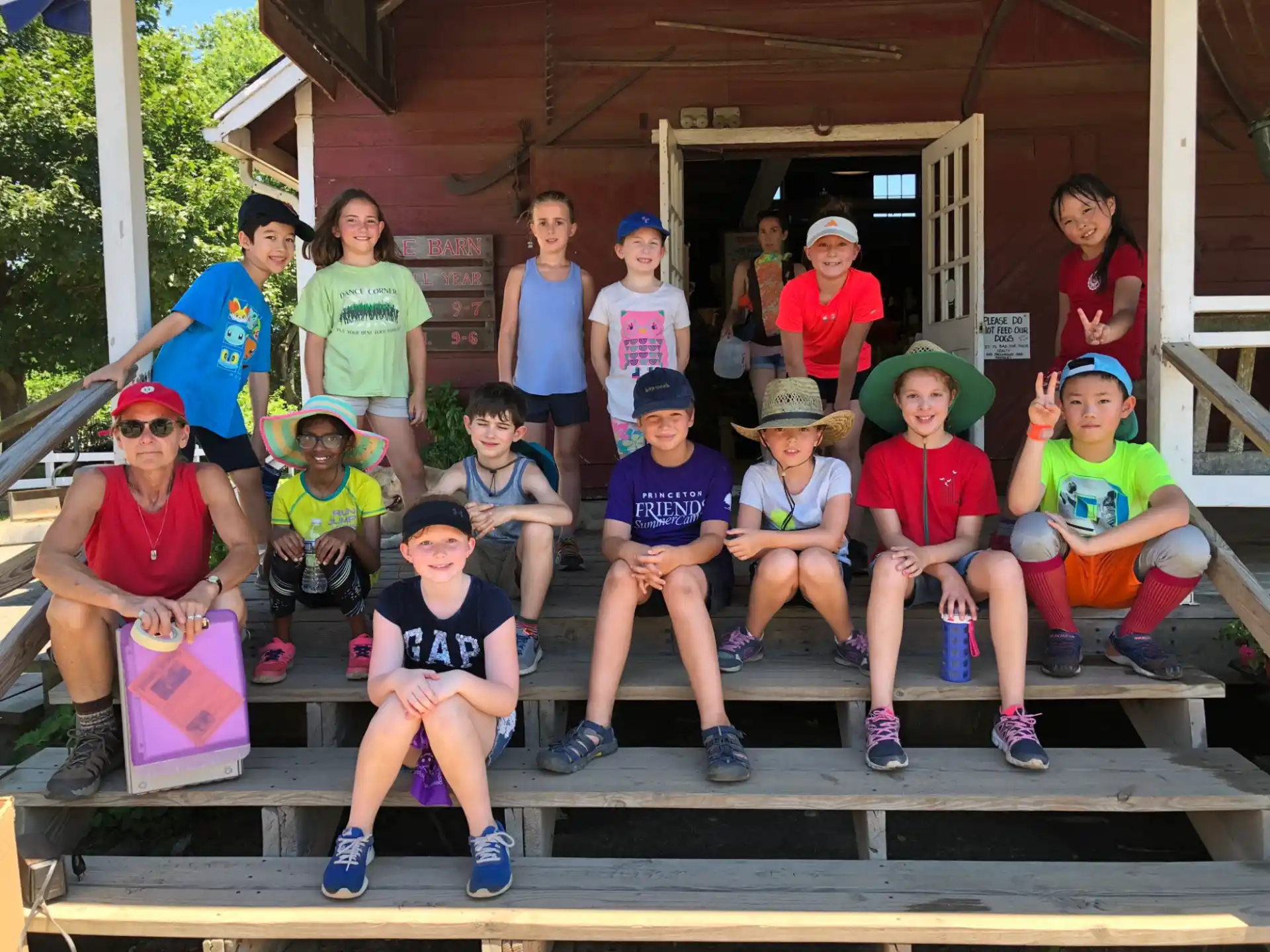 a group of kids posing for a photo