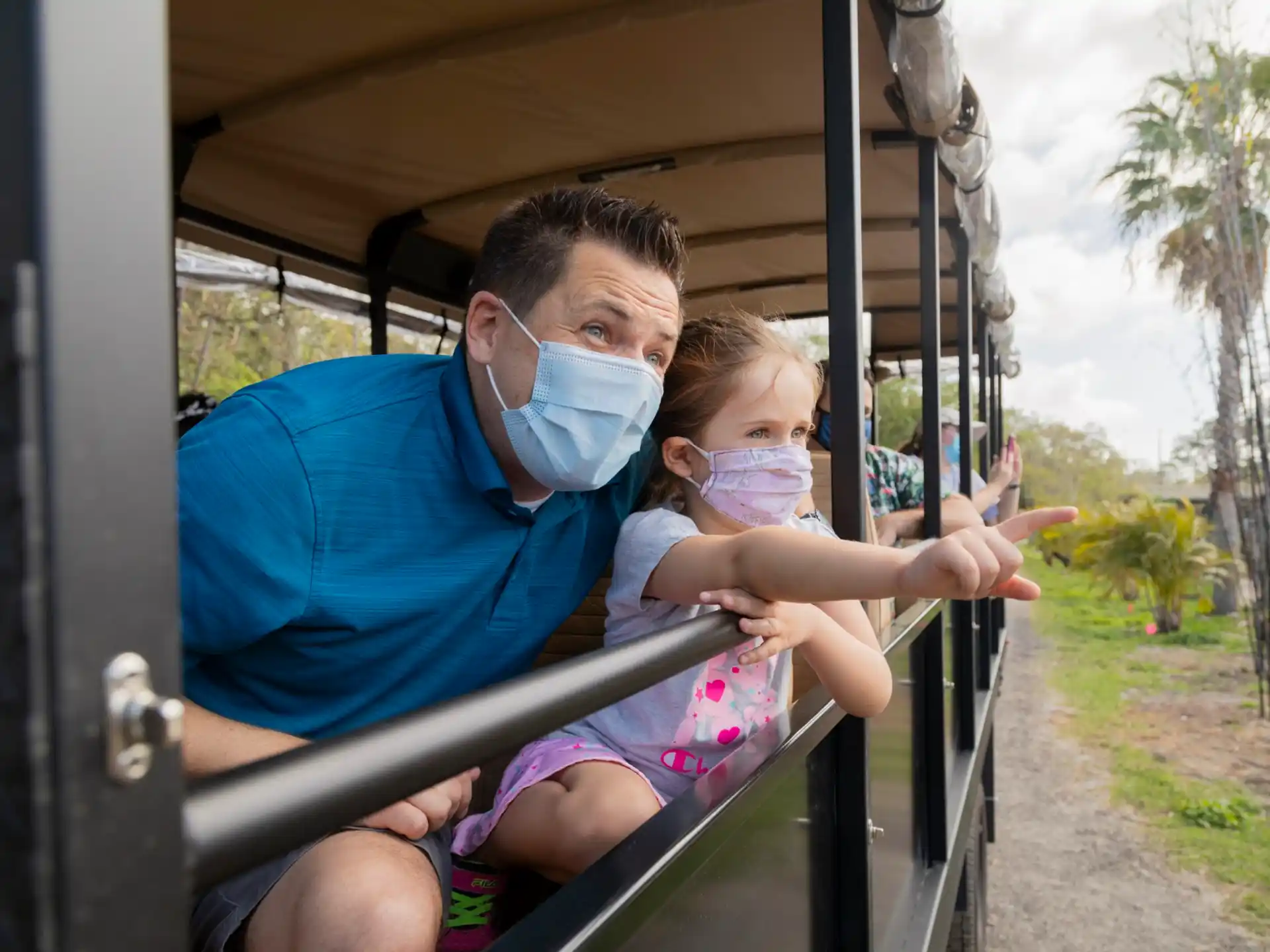 a man and a child on a ride