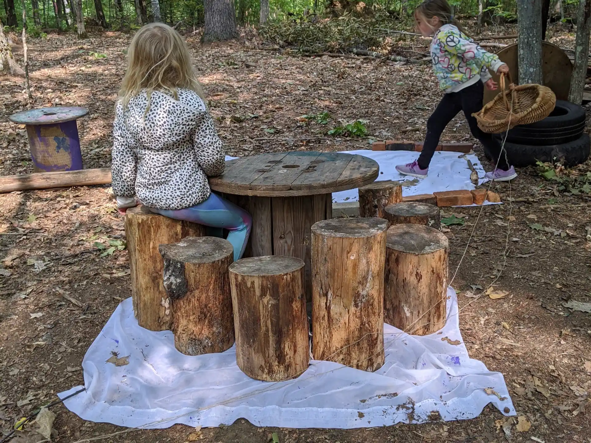 a couple of people building a structure outside