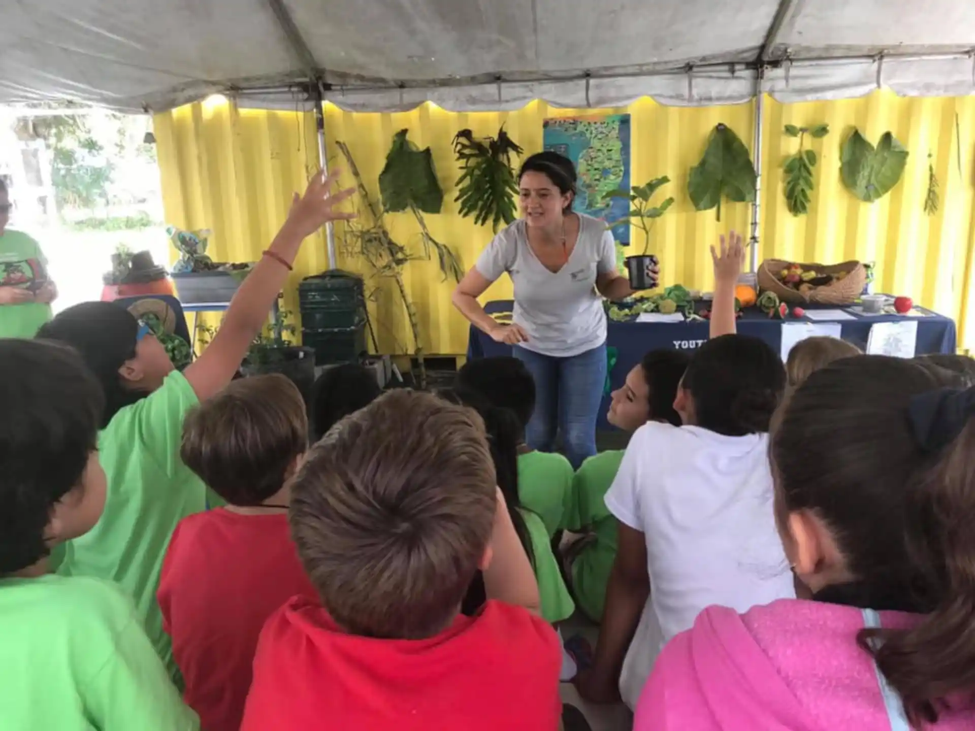 a person standing in front of a group of people