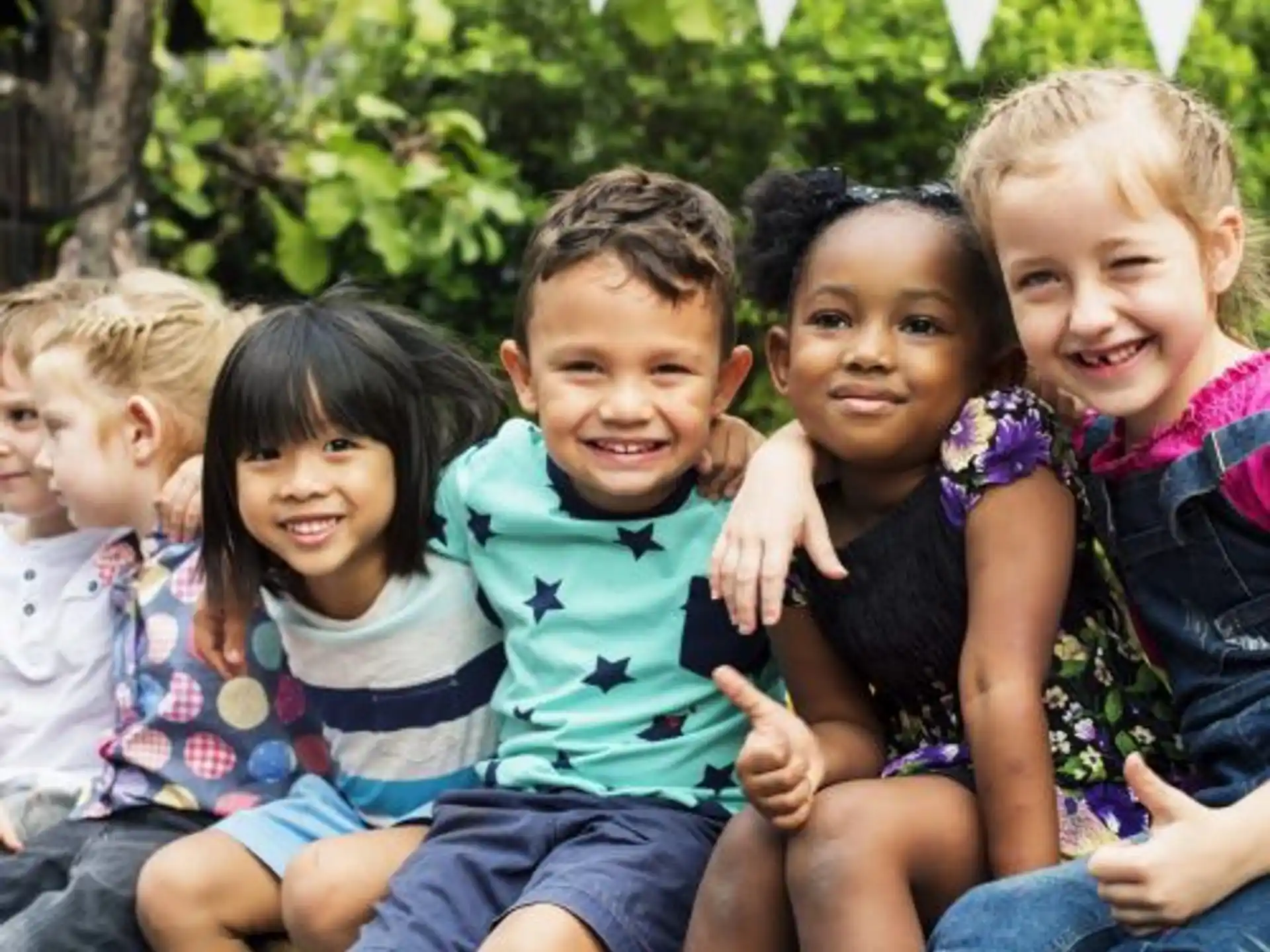 a group of children sitting together