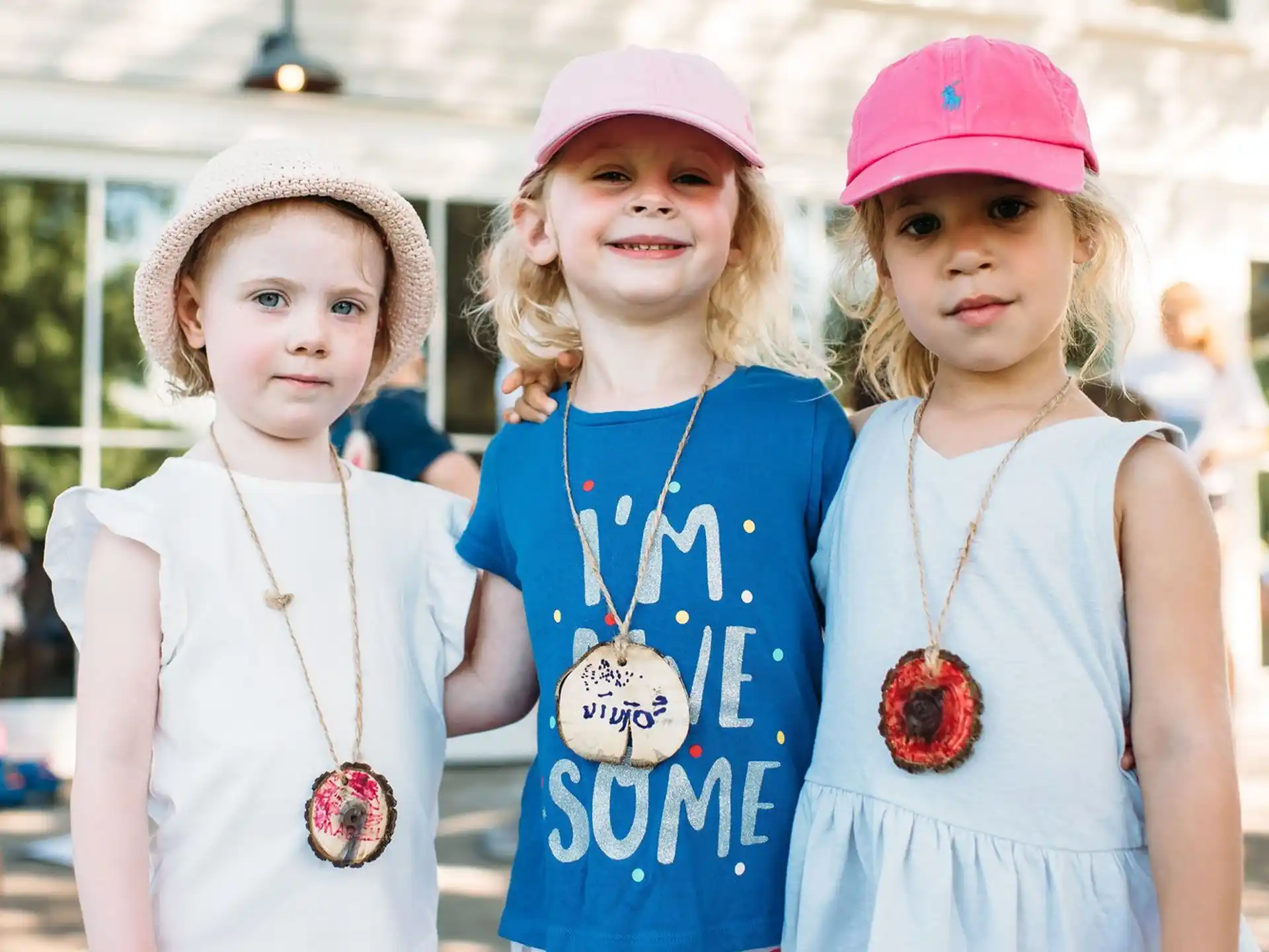 a group of girls wearing hats