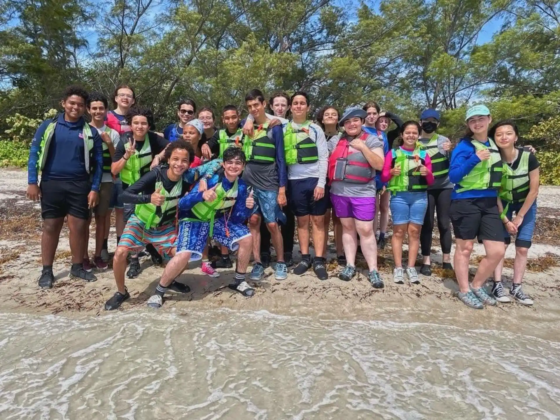 a group of people posing for a photo