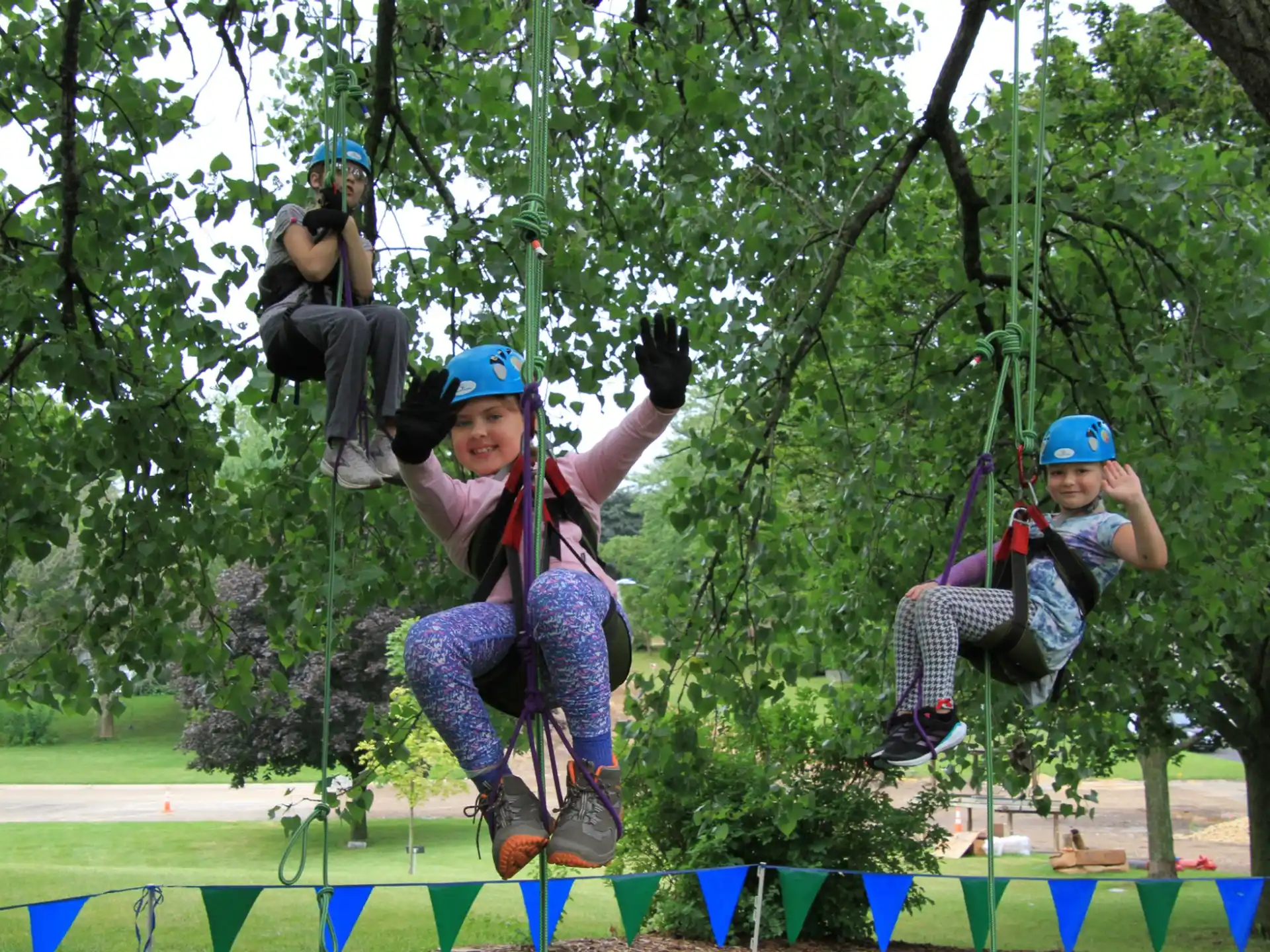 a group of people on a rope