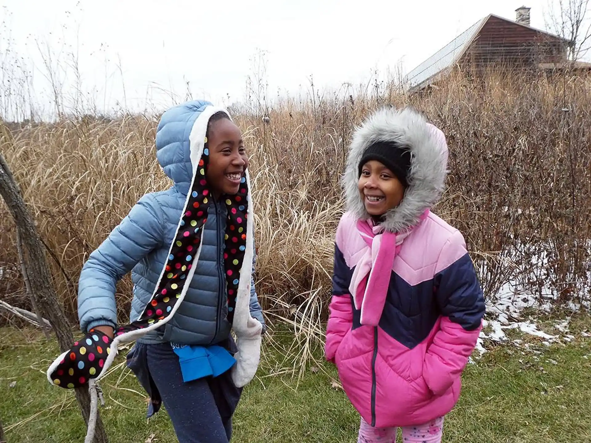 a person and a girl smiling