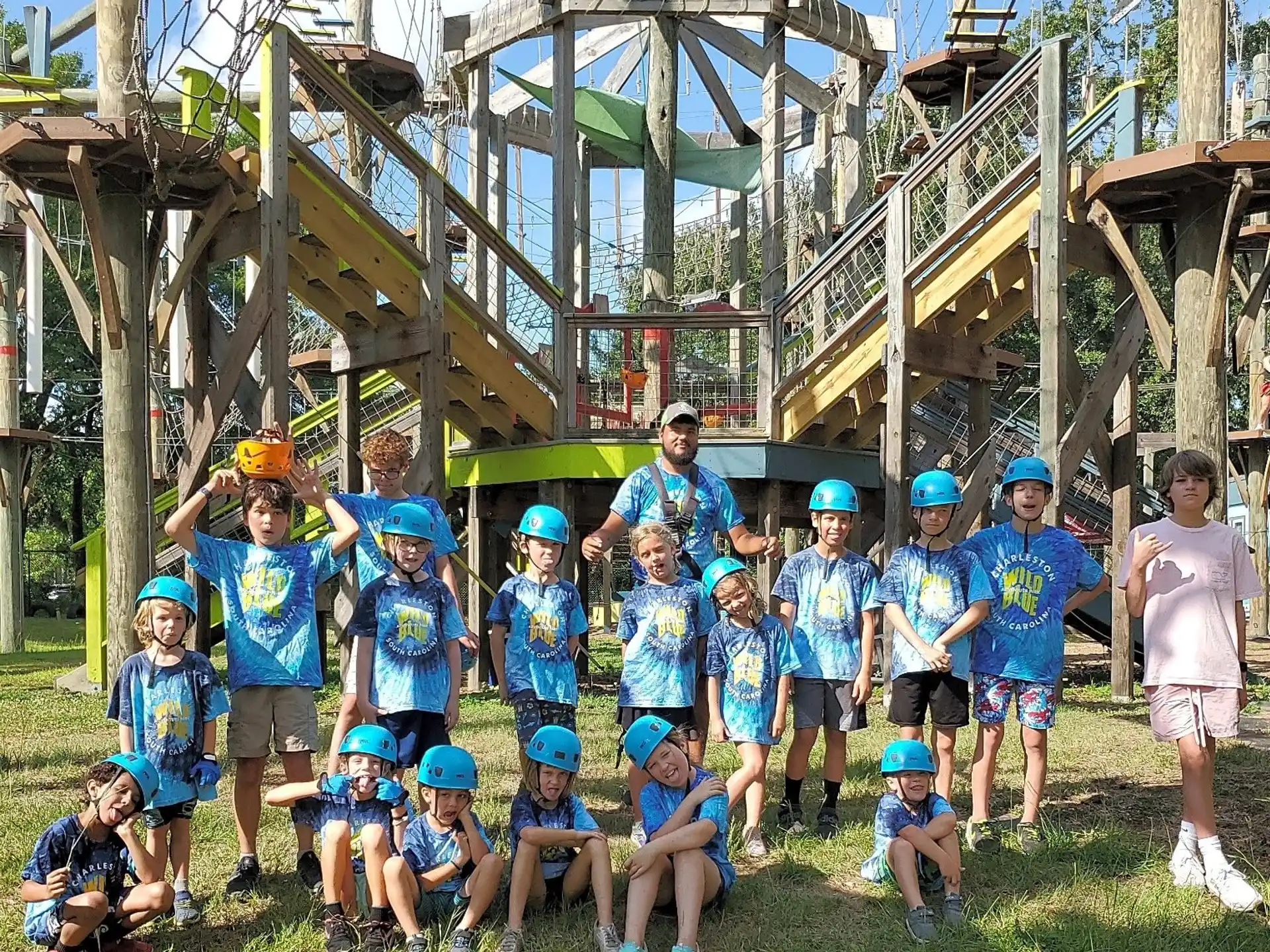 a group of kids wearing helmets