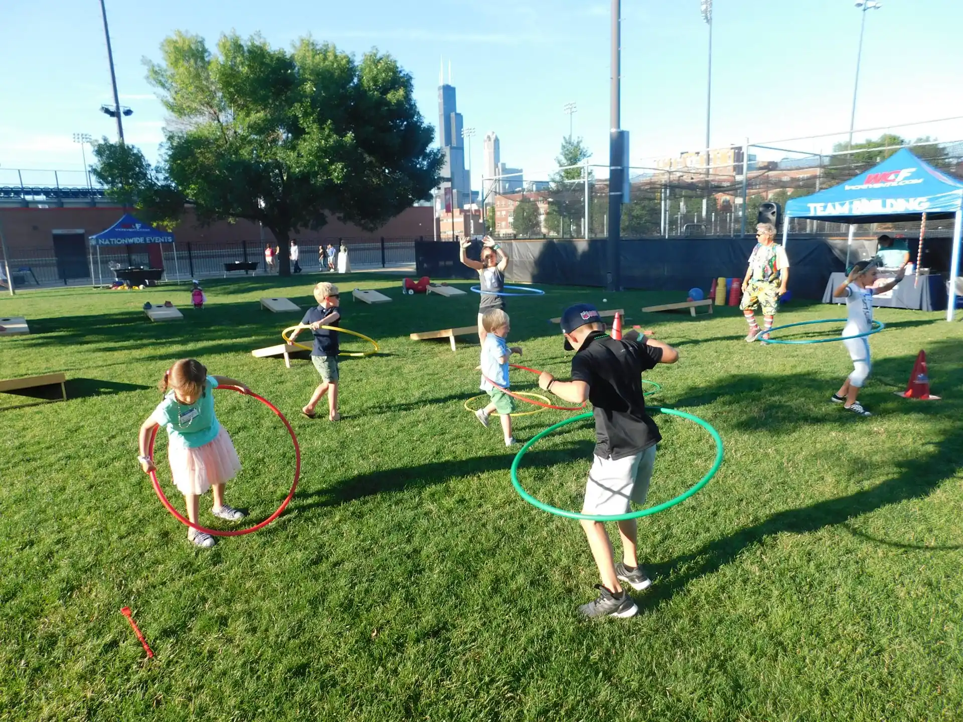 a group of kids playing in a field