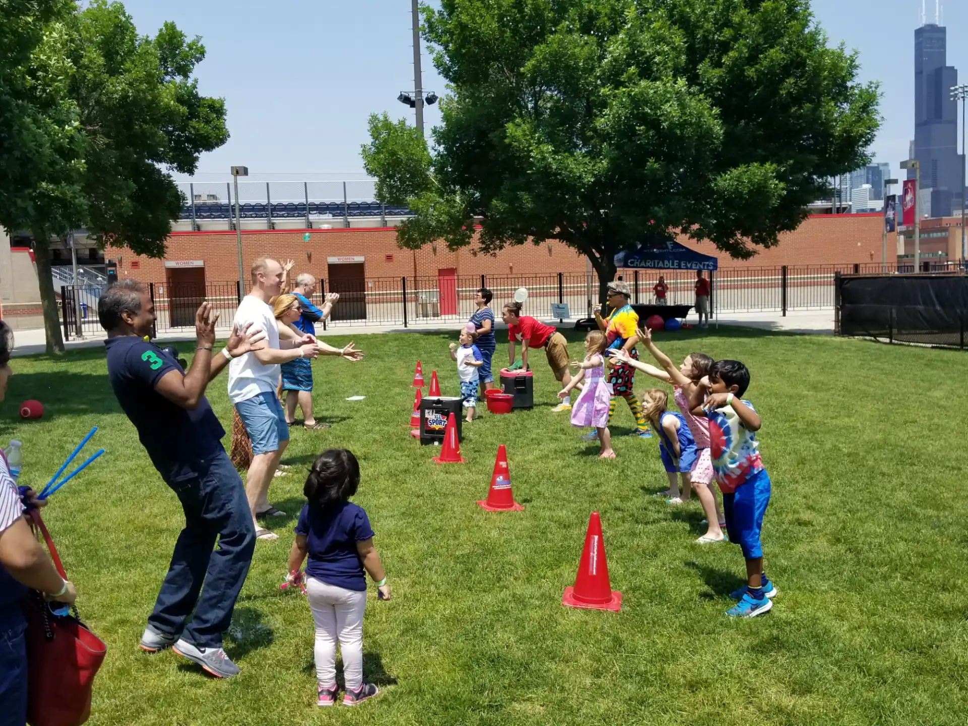 a group of people playing with a toy