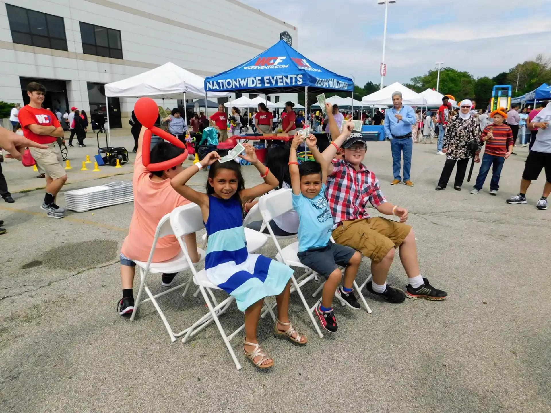 a group of people sitting in chairs