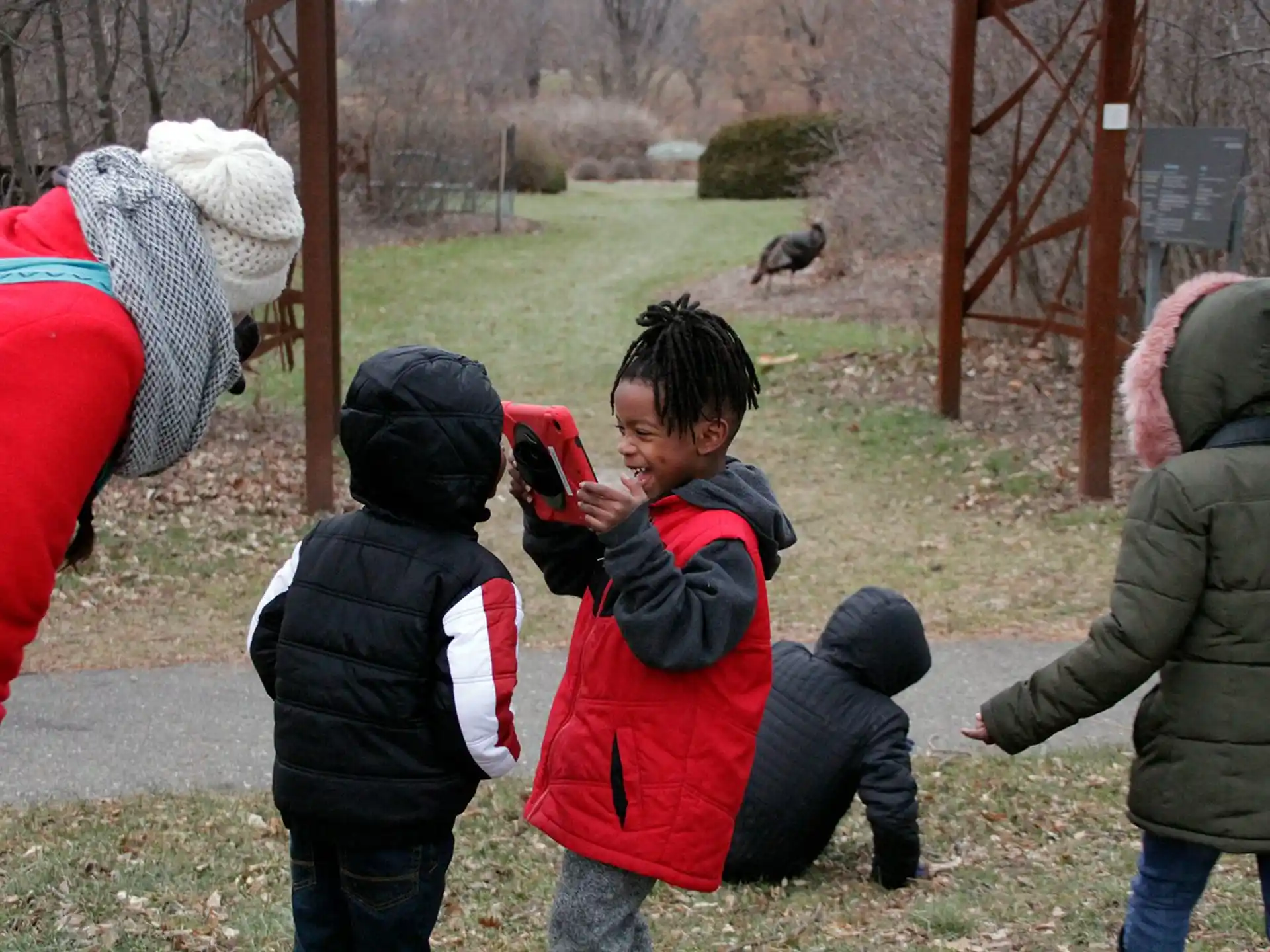 a group of kids playing with a toy