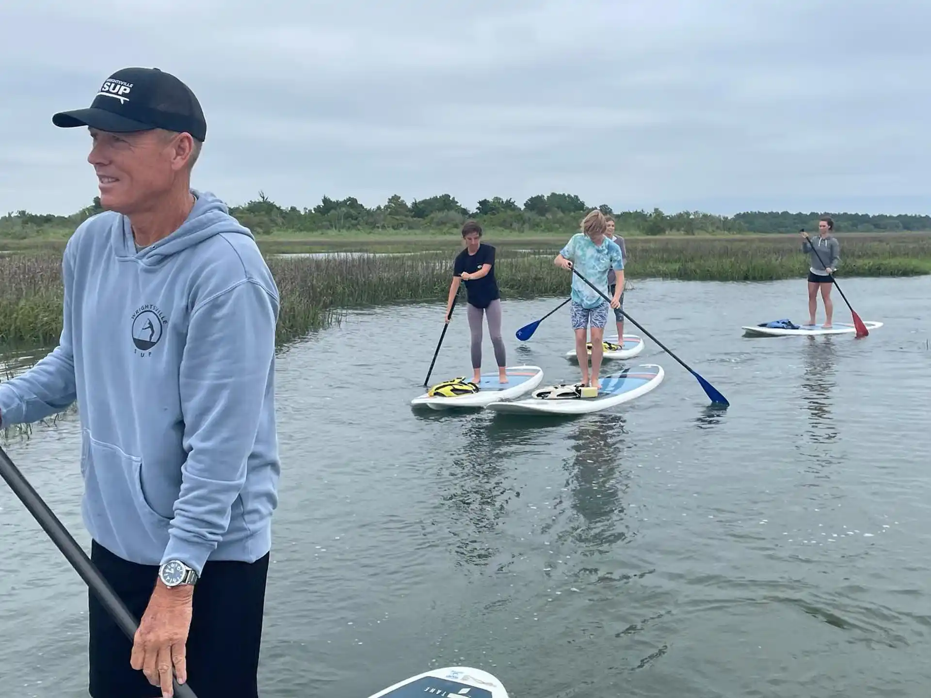a group of people on a lake