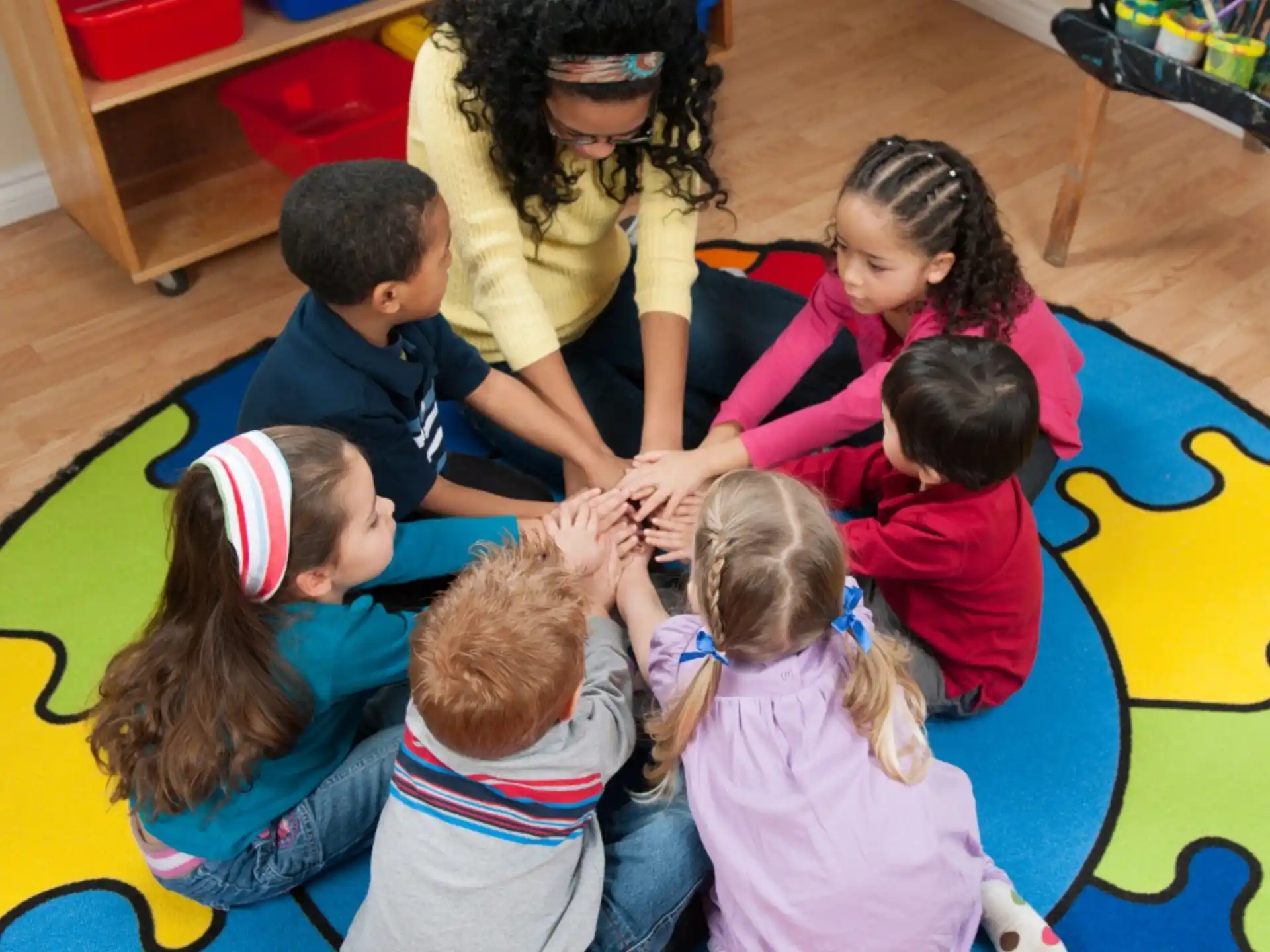 a group of children sitting on the floor