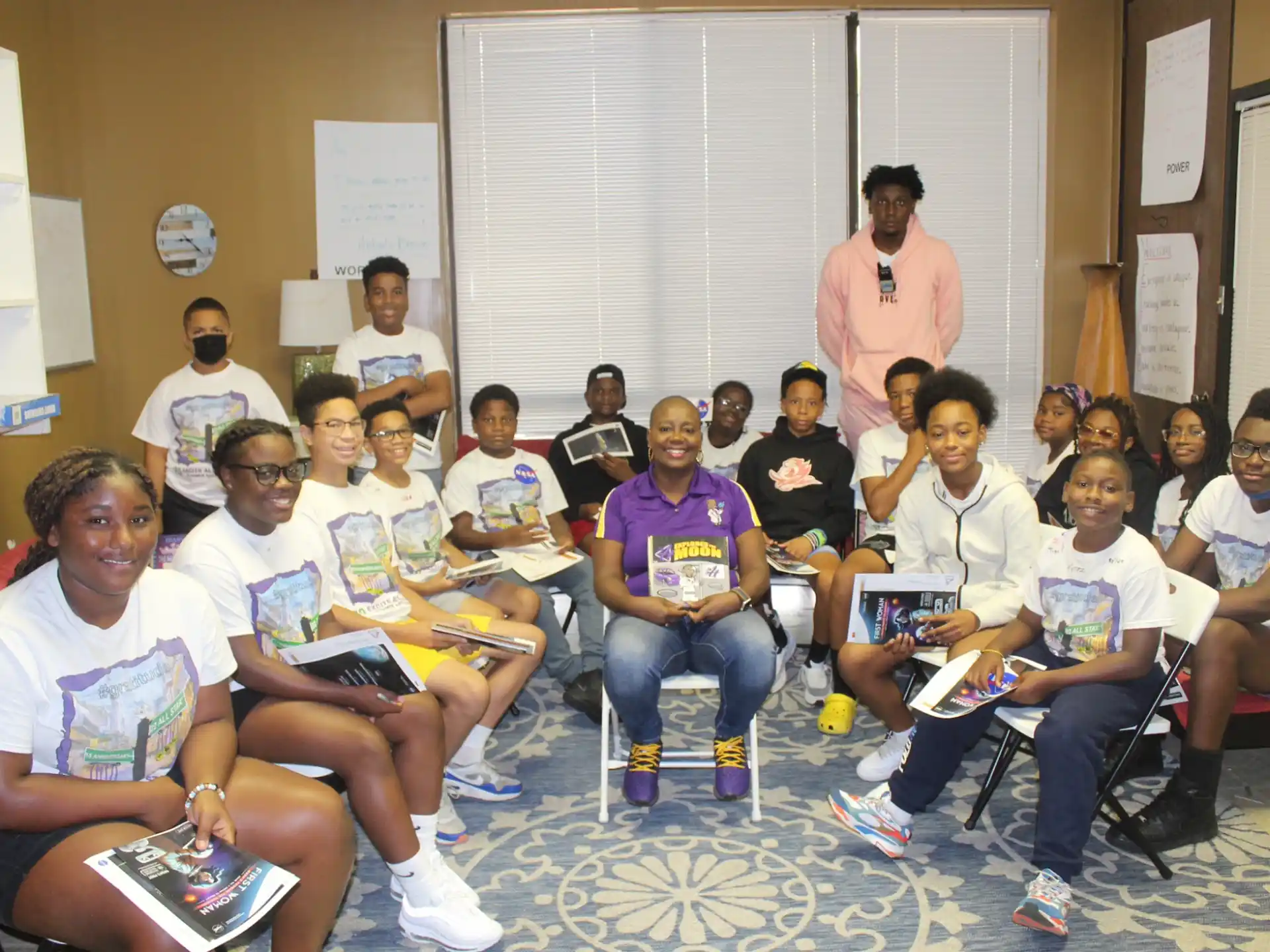 a group of people sitting in a room