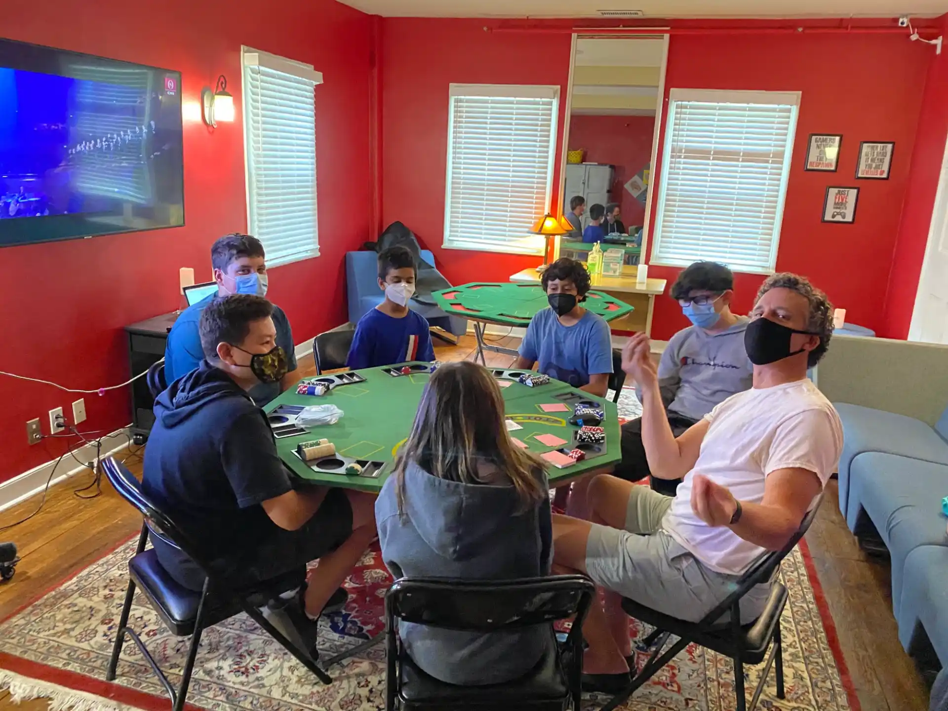 a group of people sitting around a table
