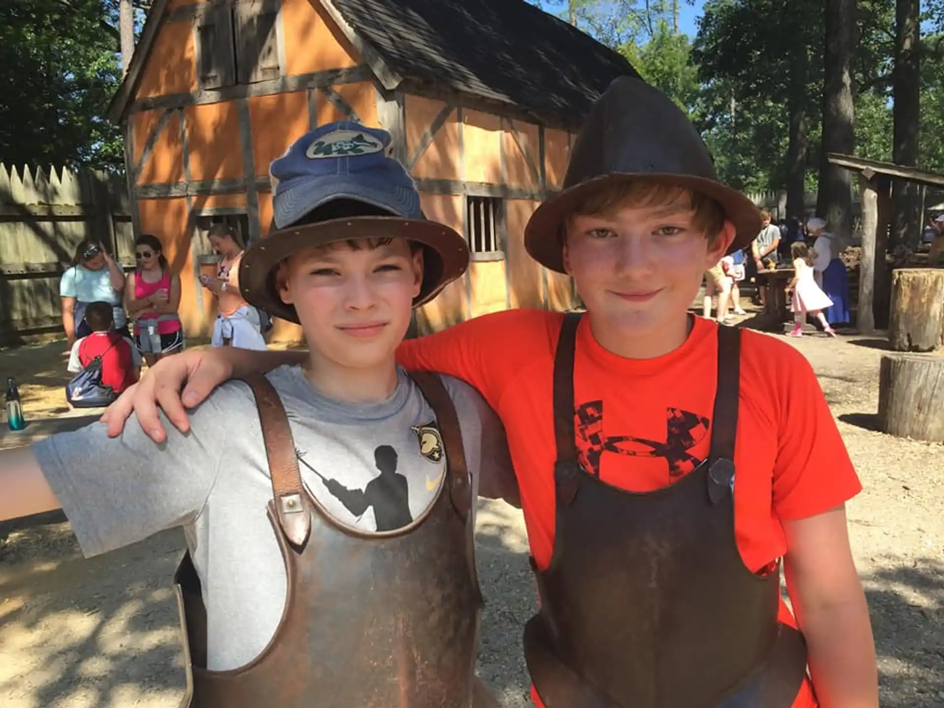 two boys wearing hats