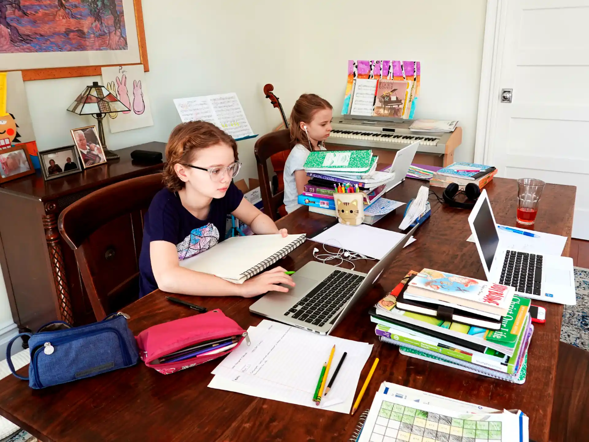 kids using laptops on a table