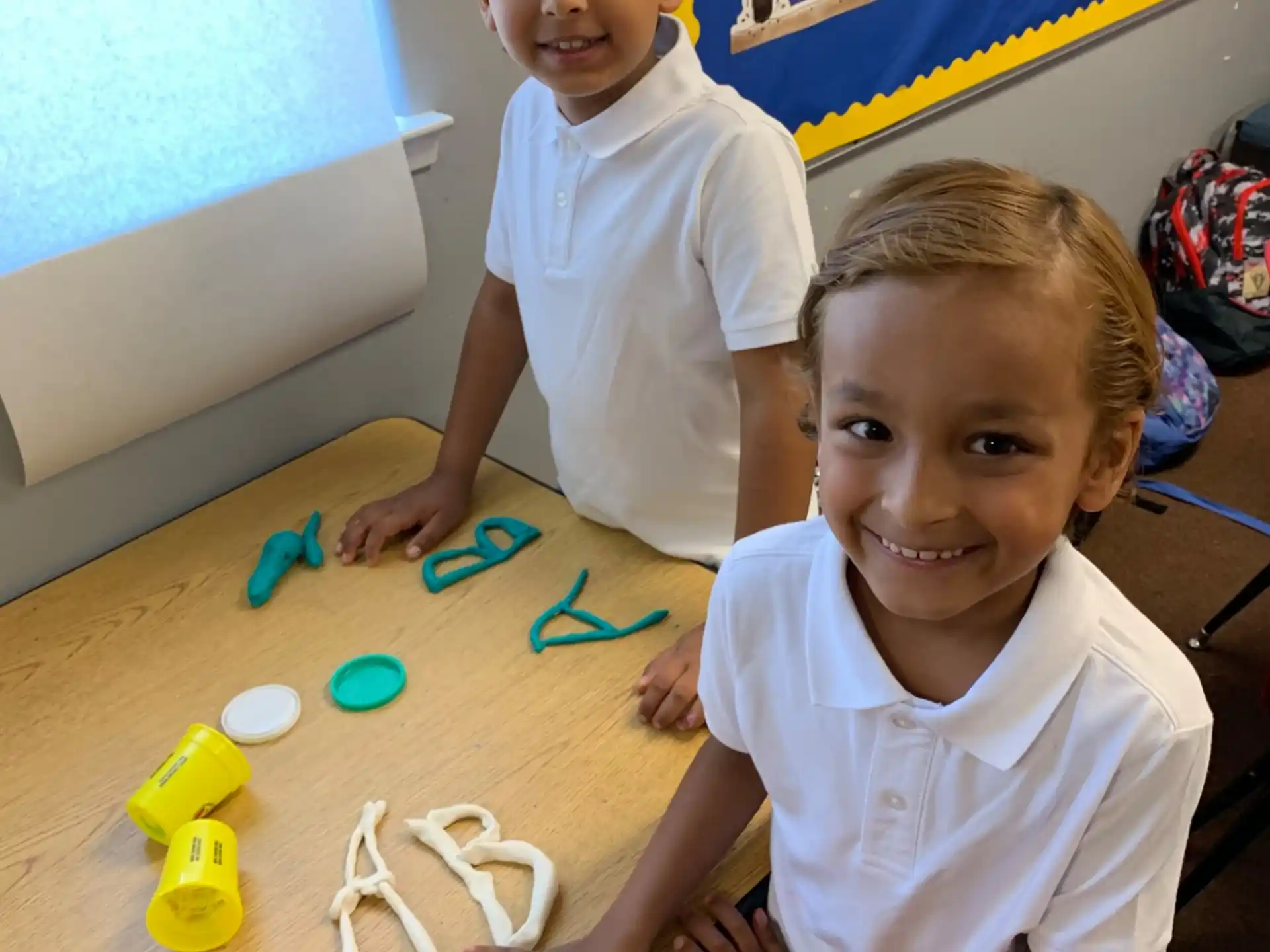 a couple of kids playing with toys