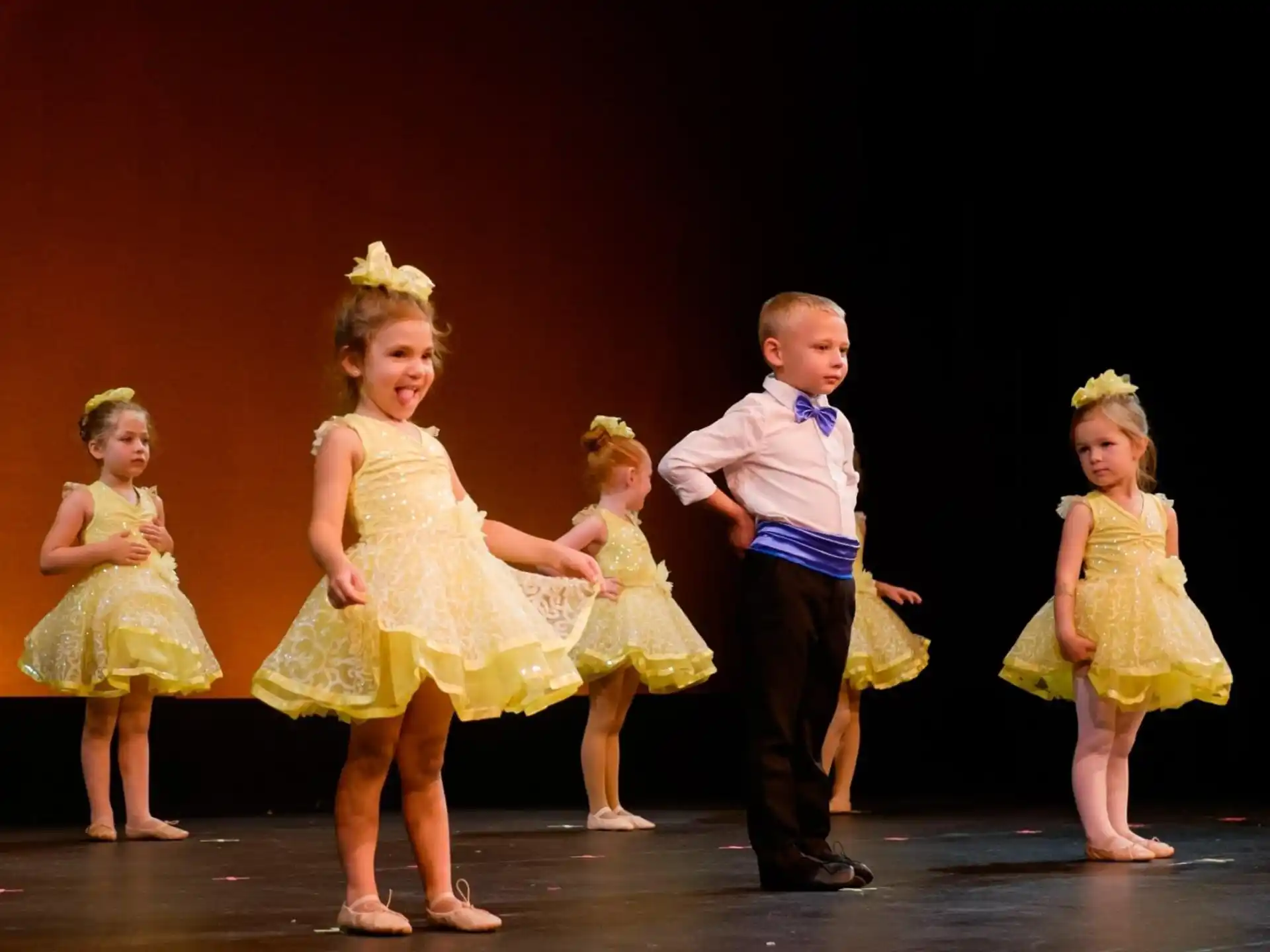 a group of children on a stage