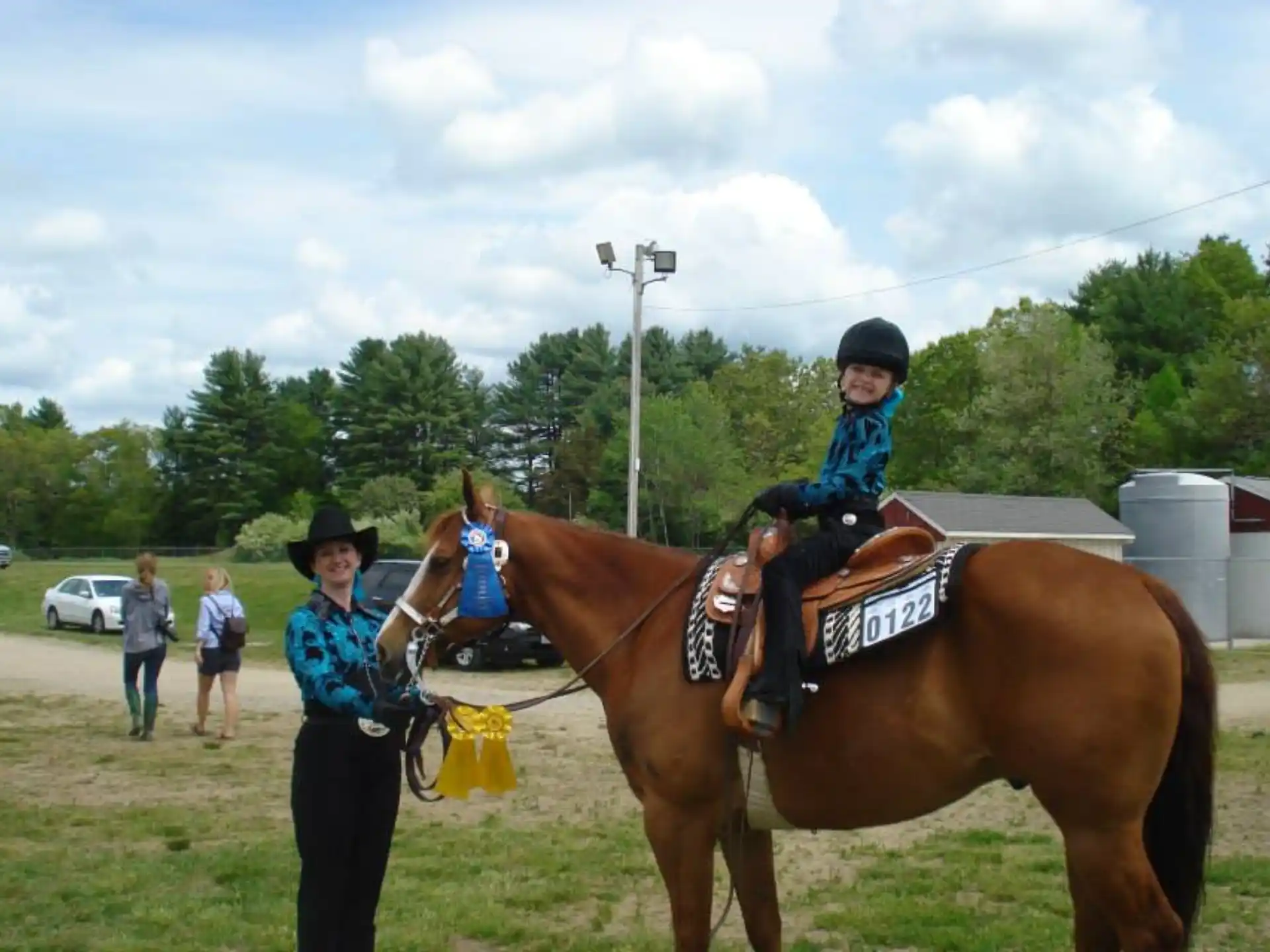 a girl riding a horse
