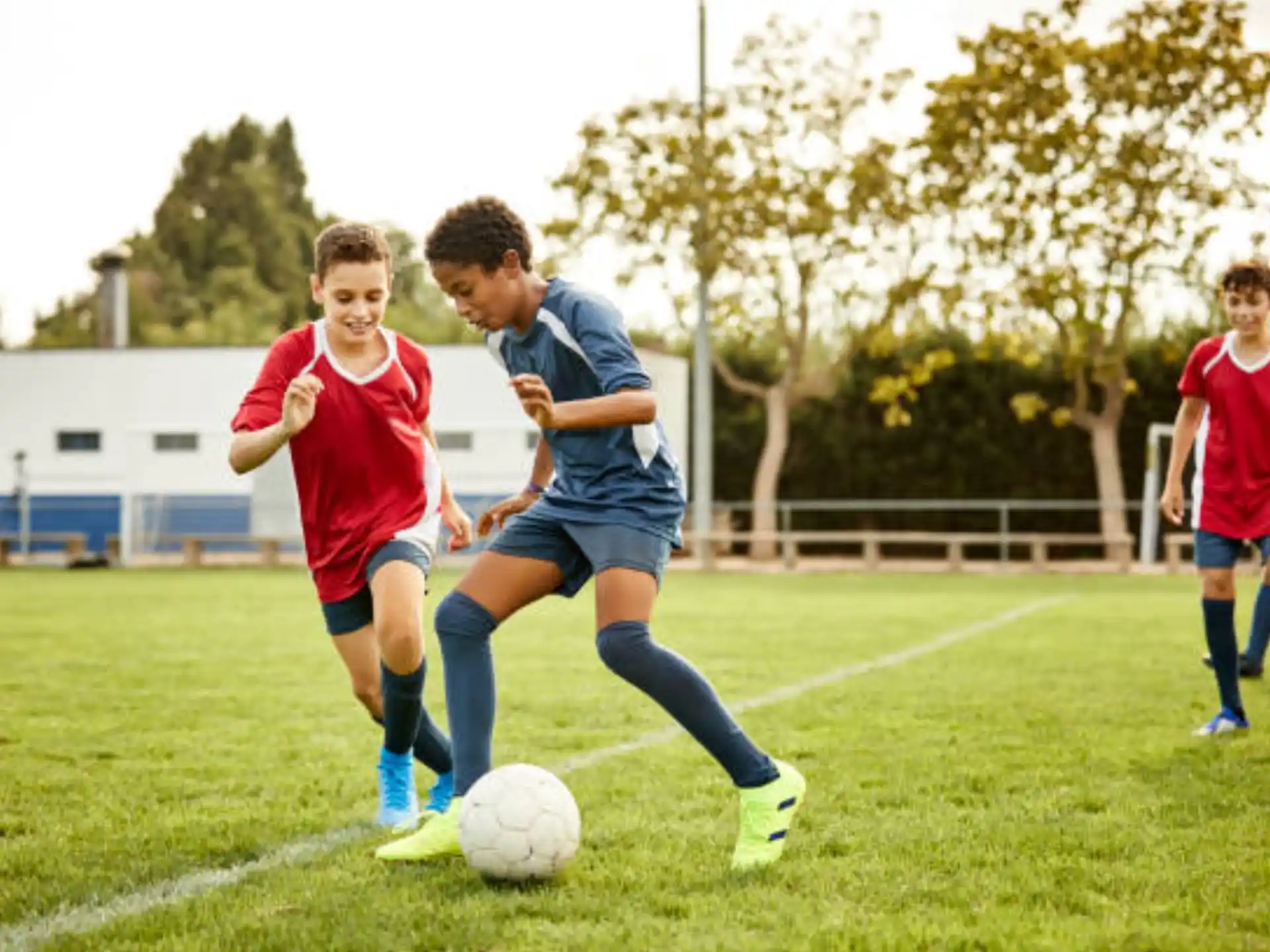 a group of boys playing football