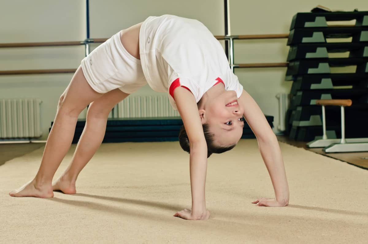 a person doing a handstand
