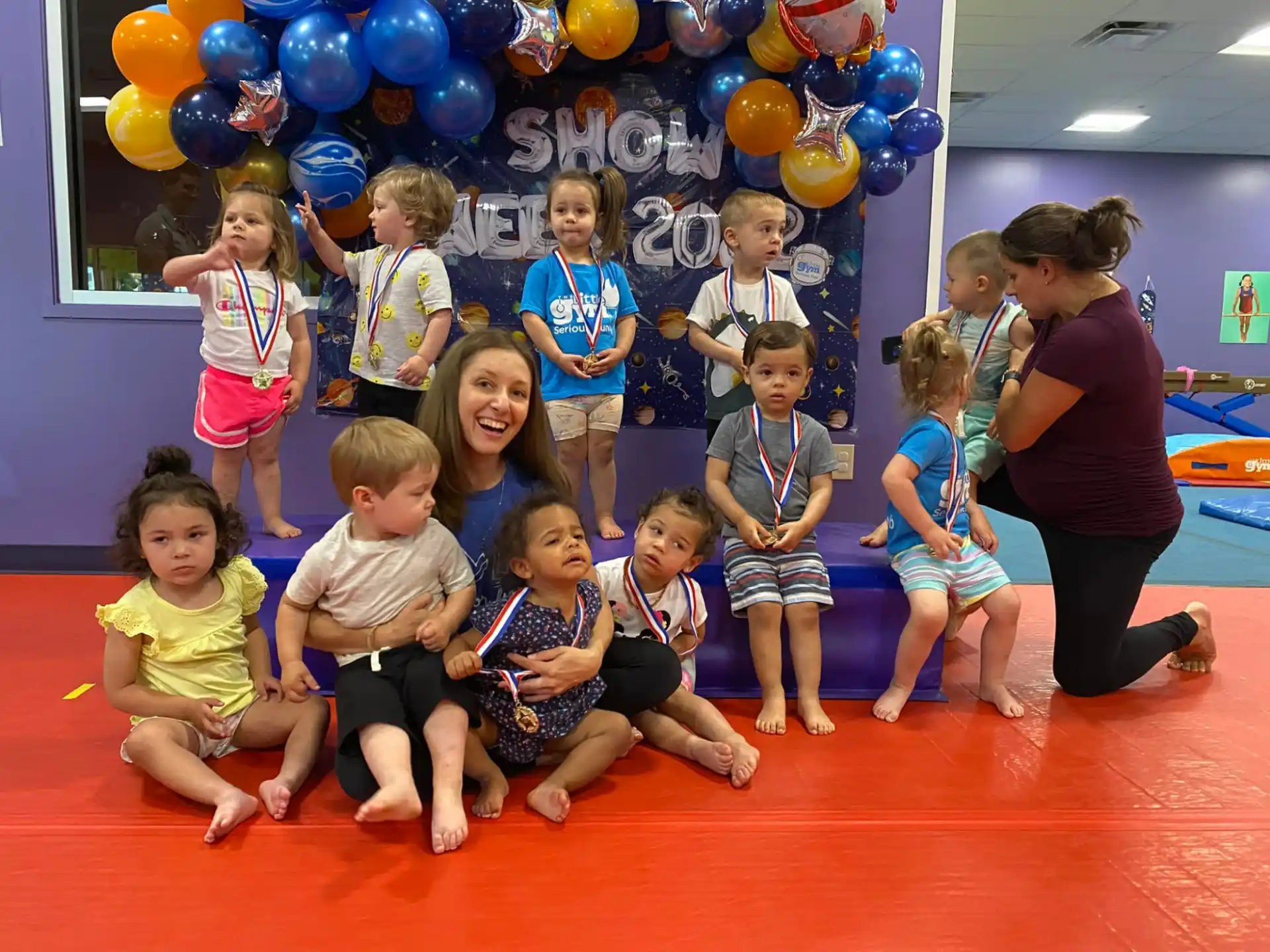 a group of children posing for a photo
