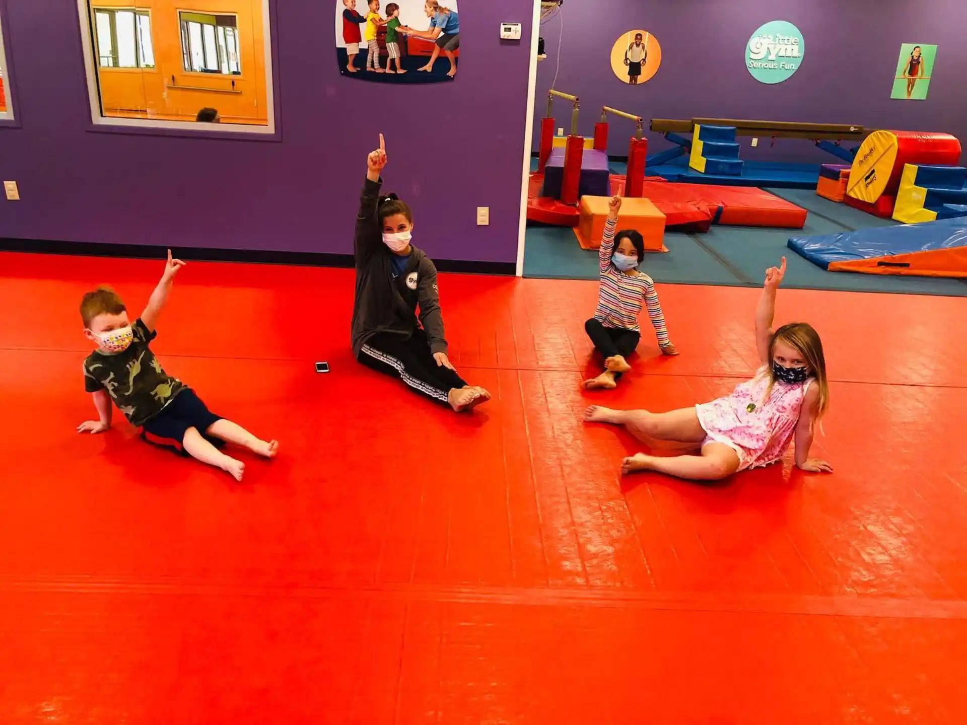 a group of people in a gym