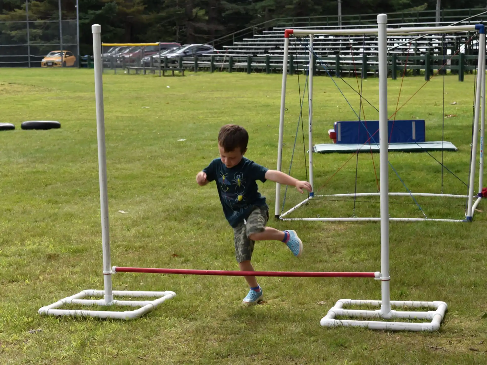 a boy playing with a frisbee