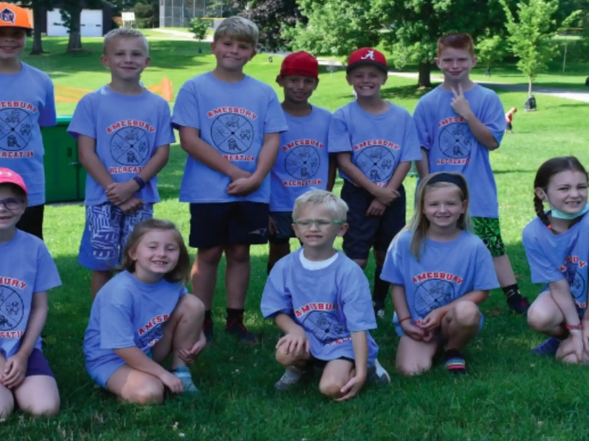 a group of children posing for a photo