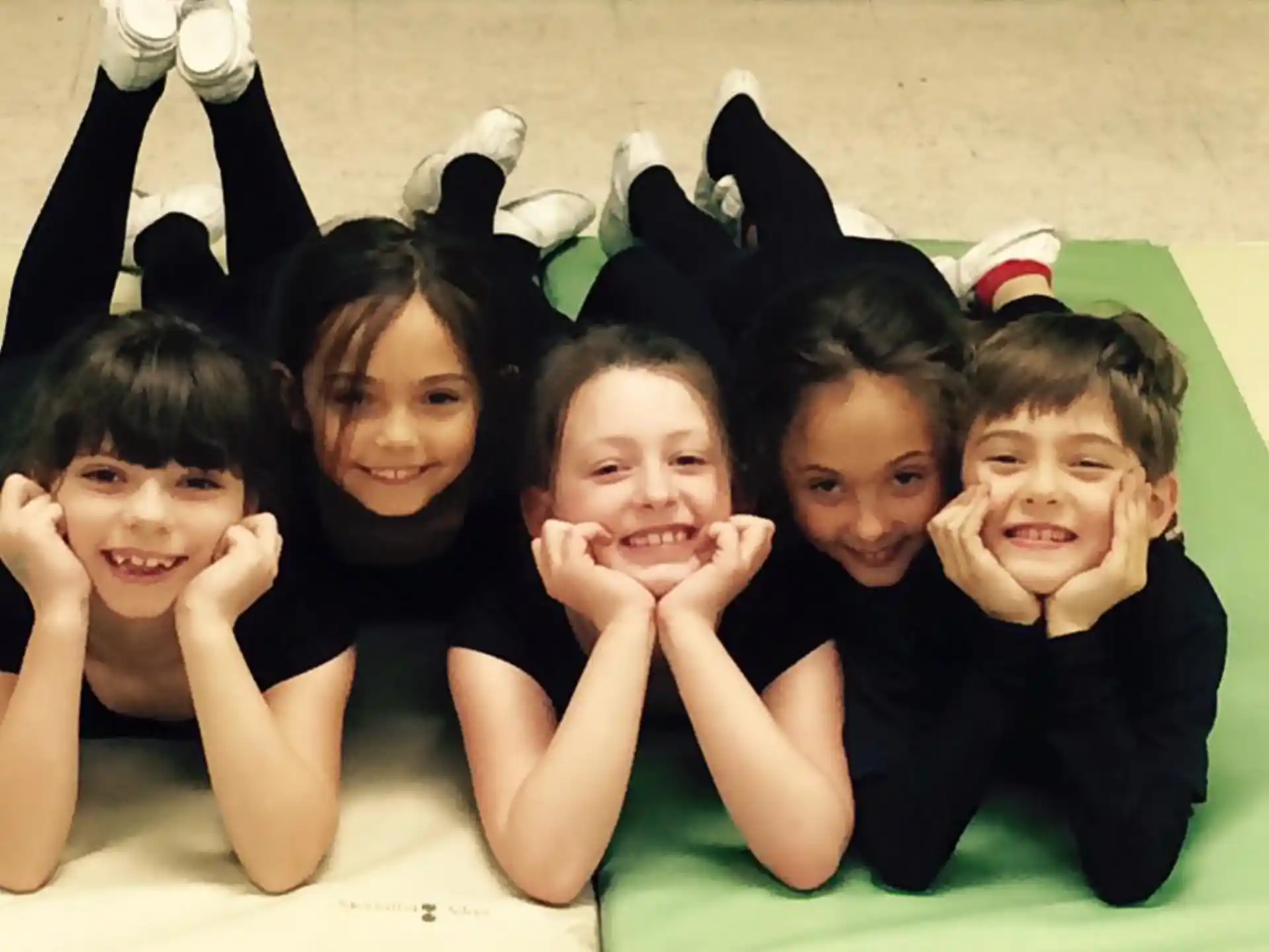 a group of children posing for a photo