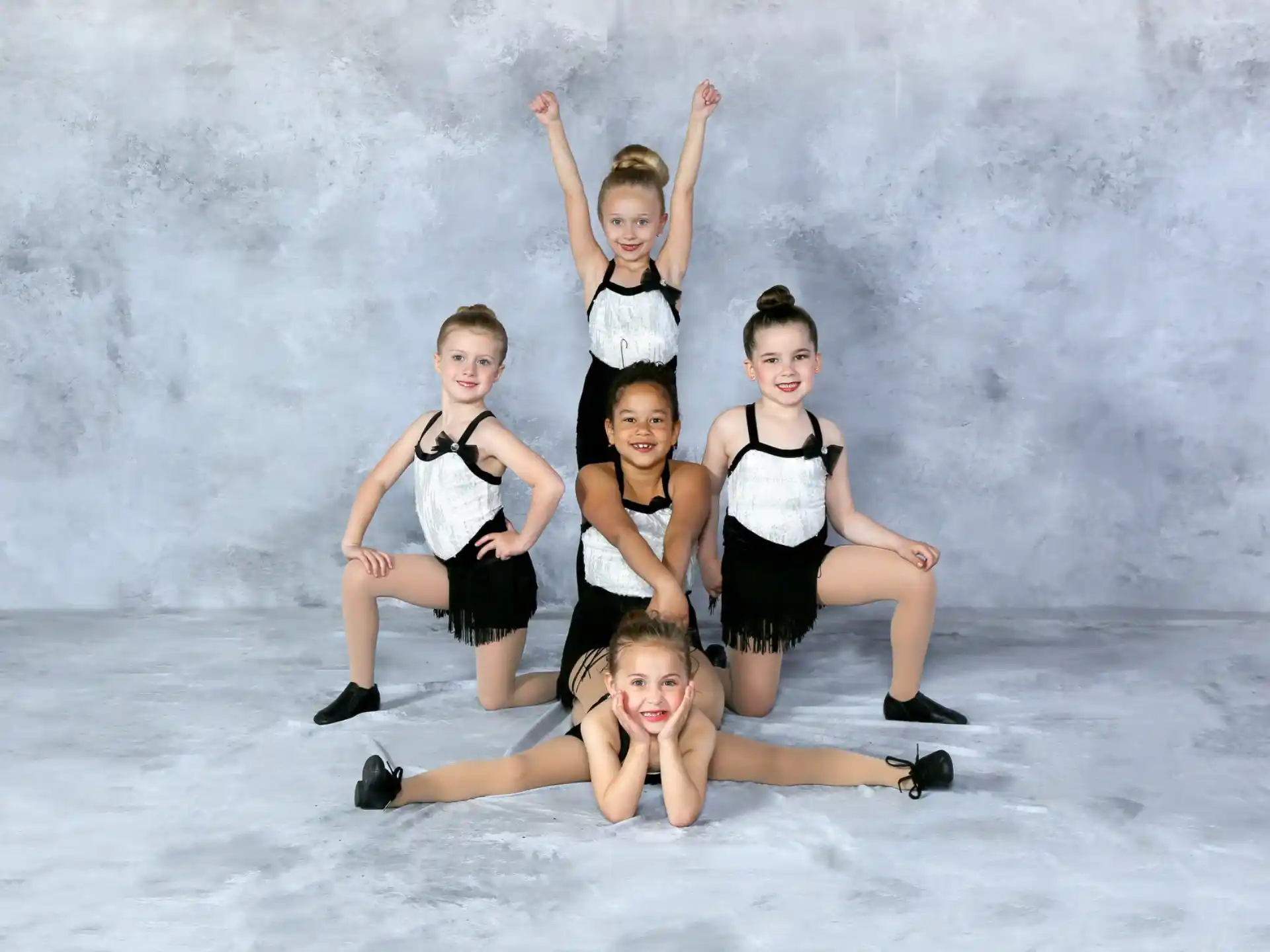 a group of people posing for the camera