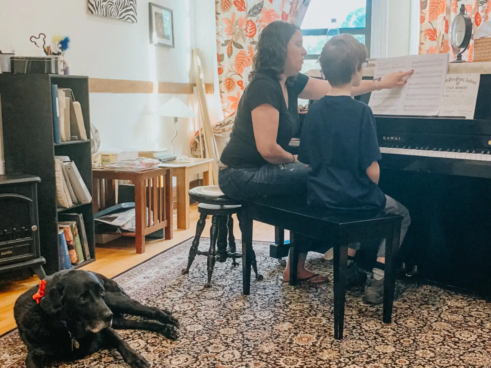 a person and a child sitting in a room