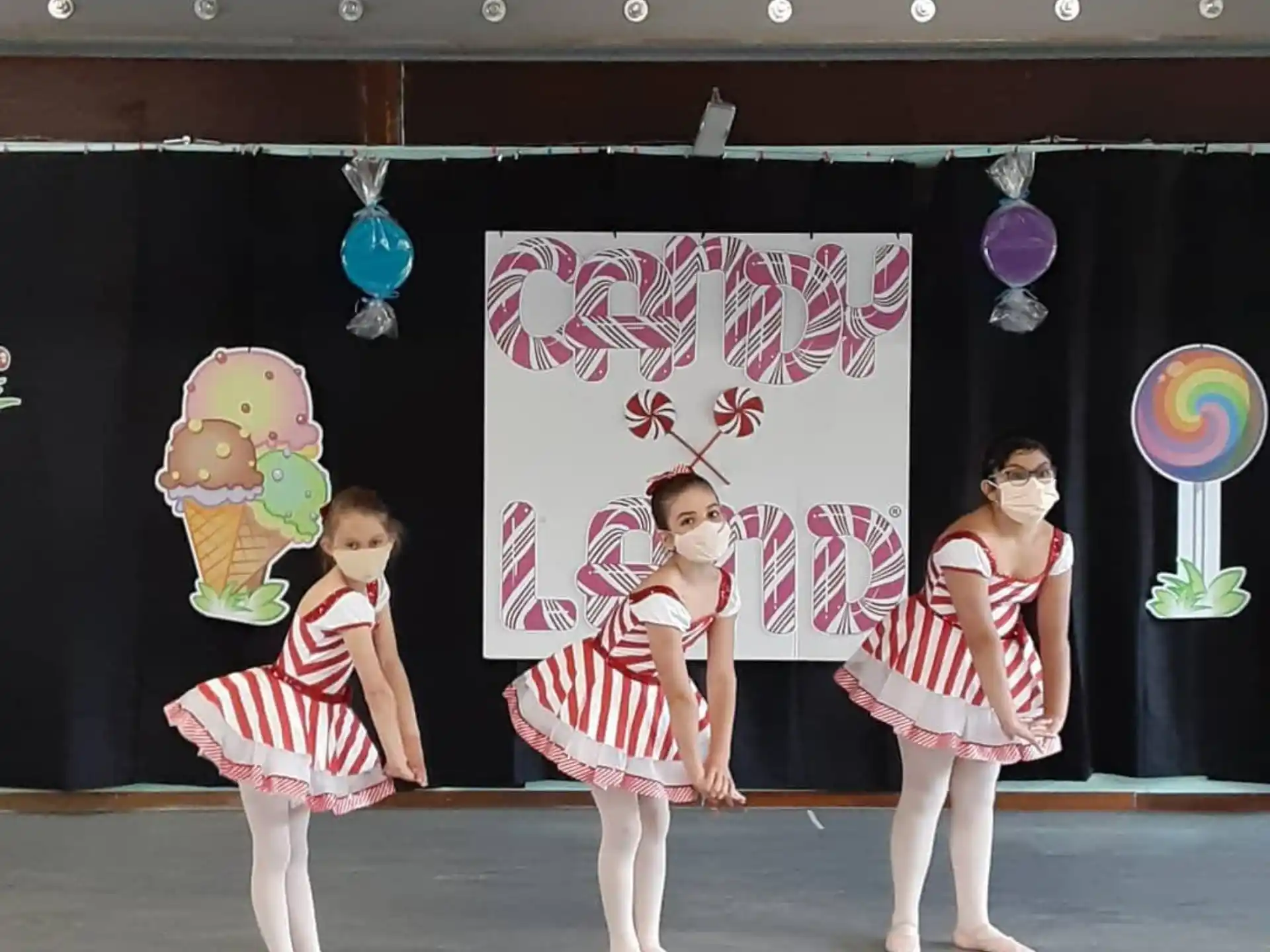 a group of girls in clothing