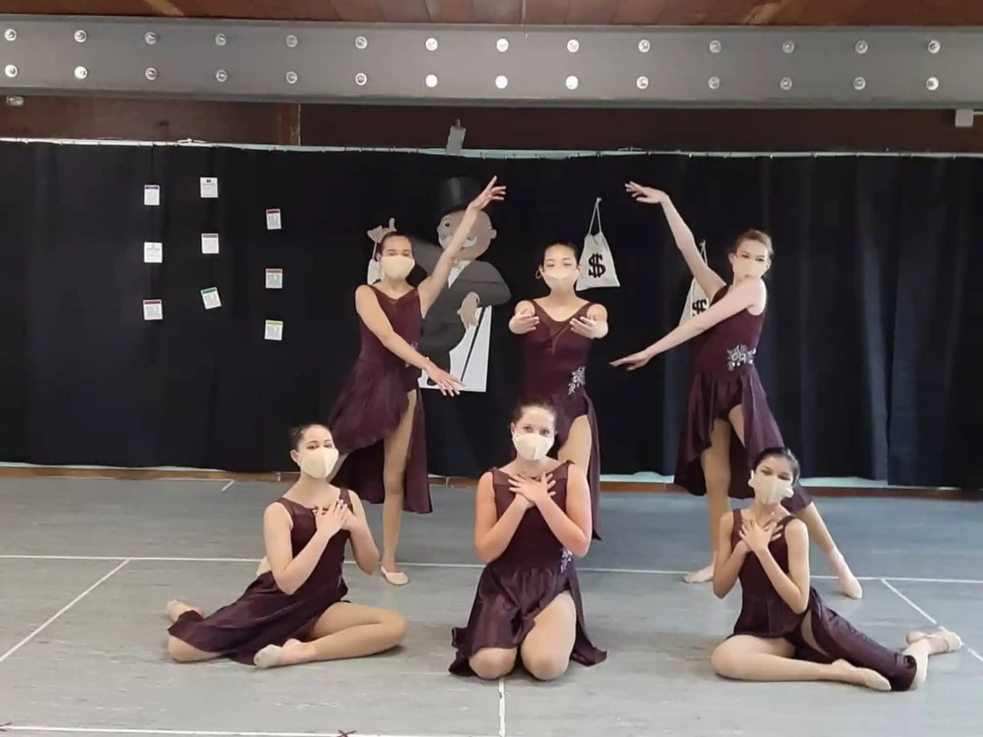 a group of women dancing on a stage