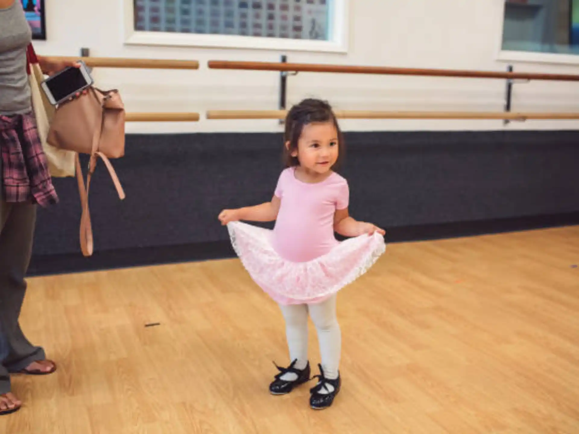 a girl in a pink dress