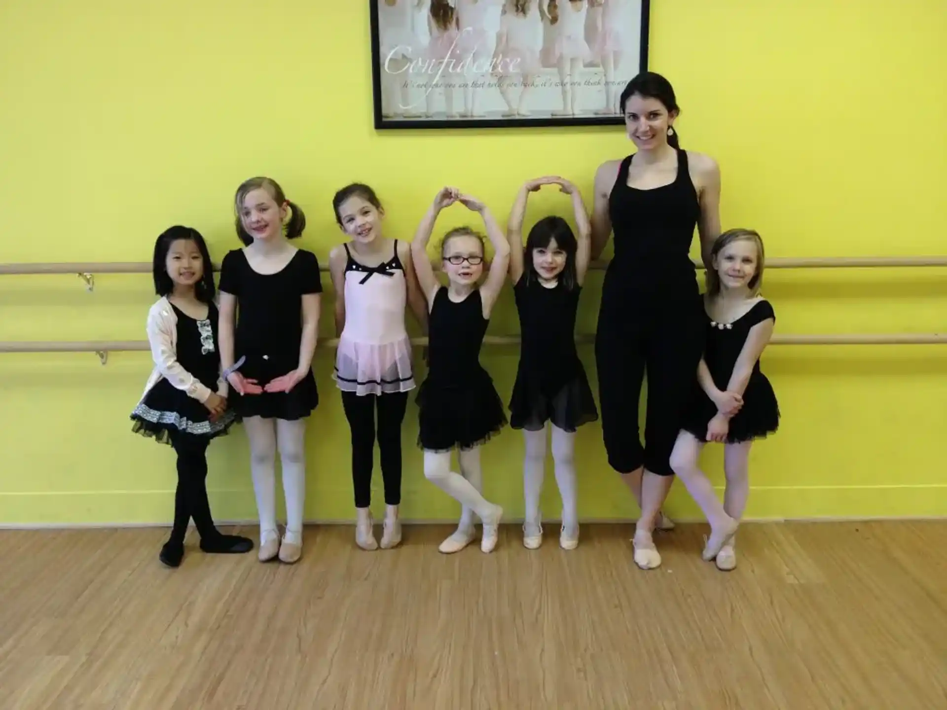 a group of girls posing for a picture