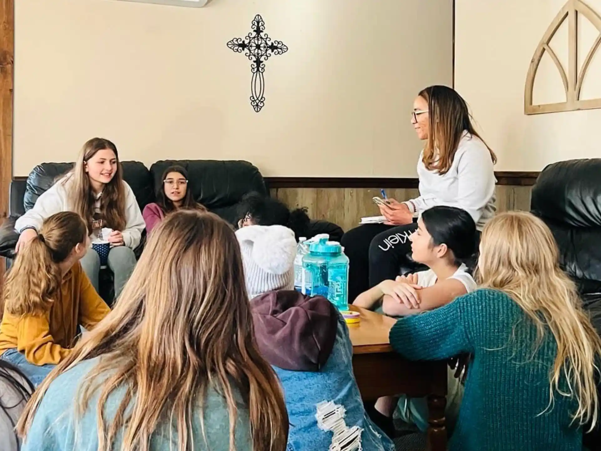 a group of people sitting in a room