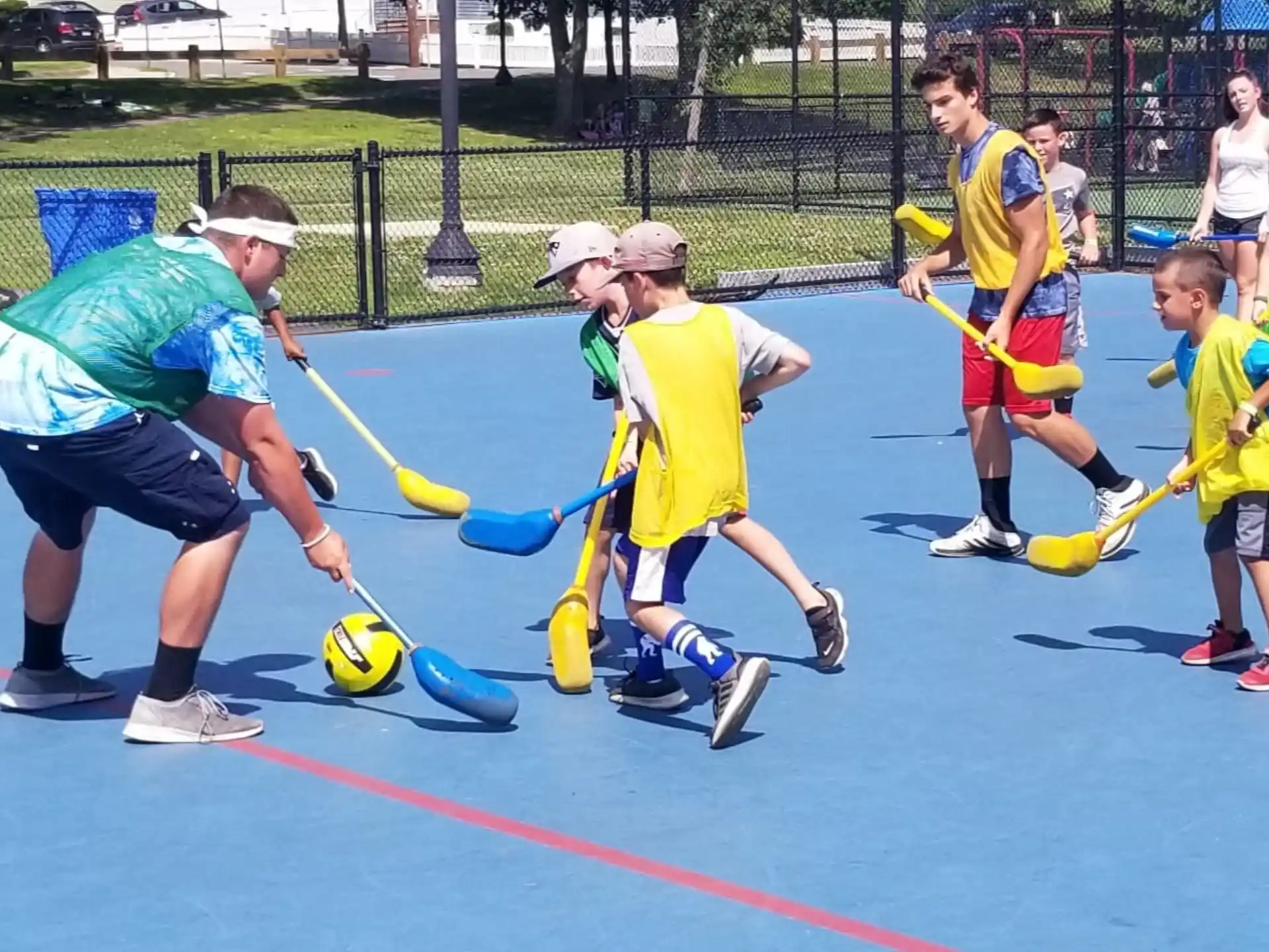 a group of kids playing with a ball