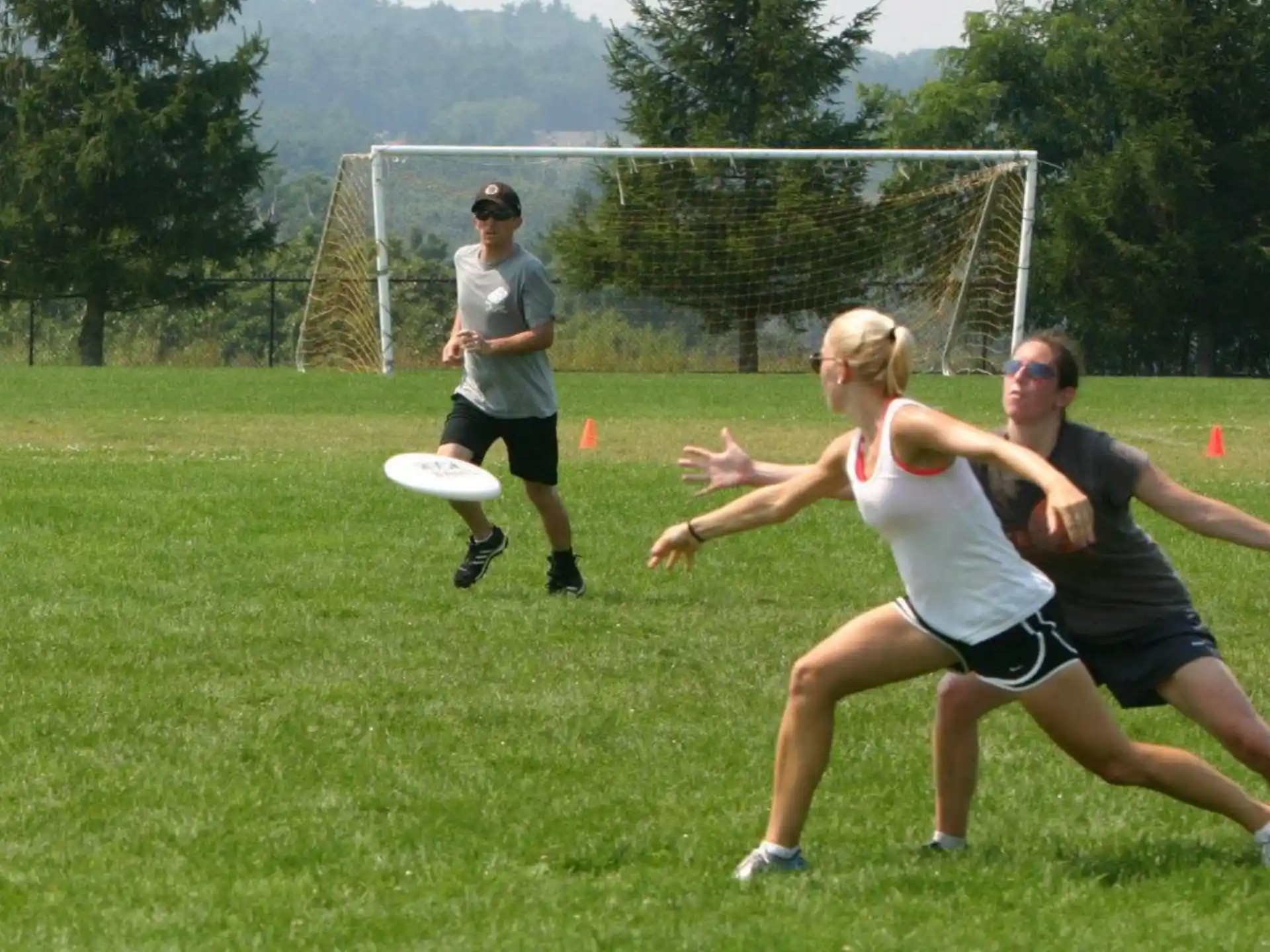 people playing with a frisbee