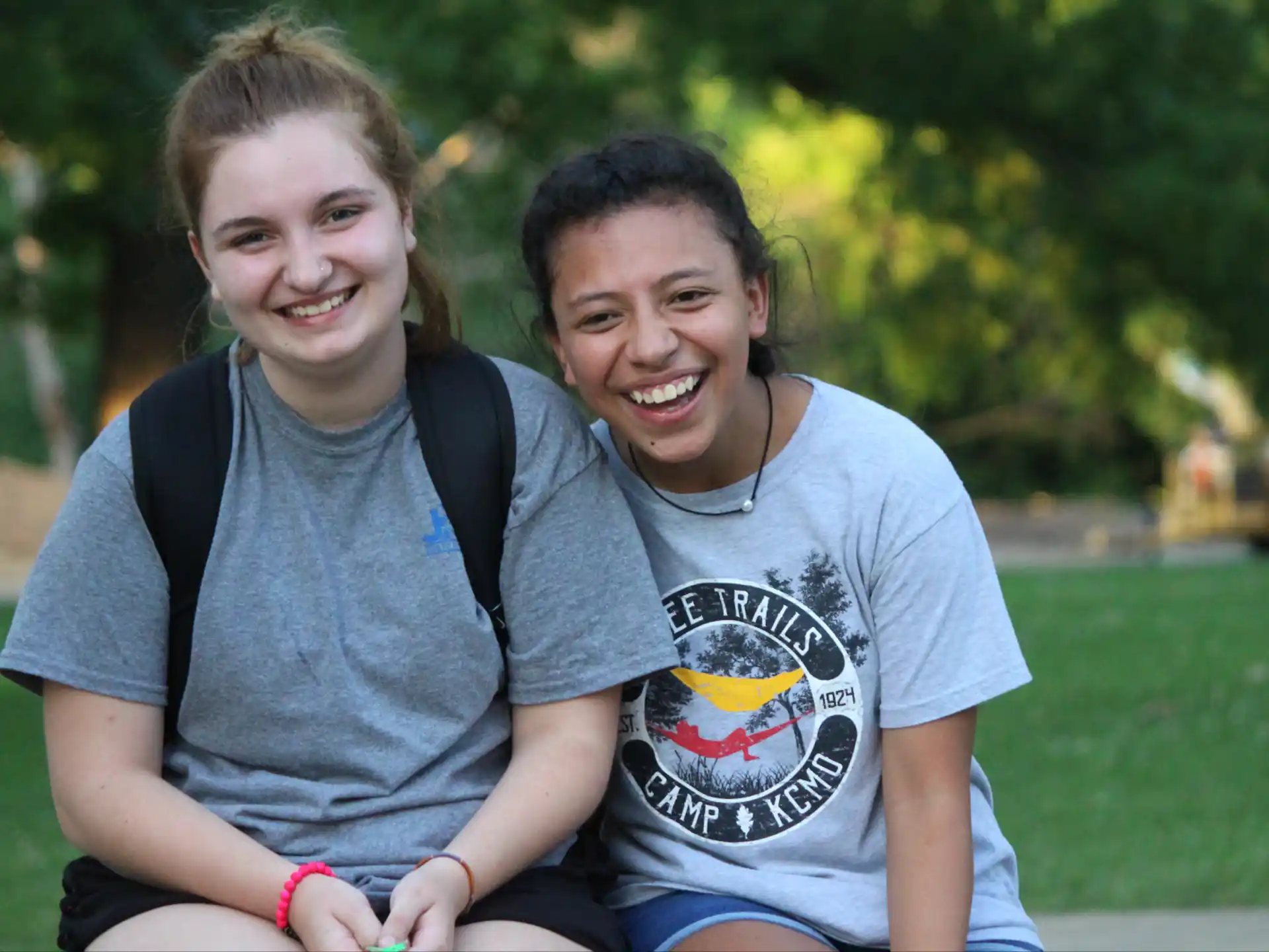 a couple of girls smiling