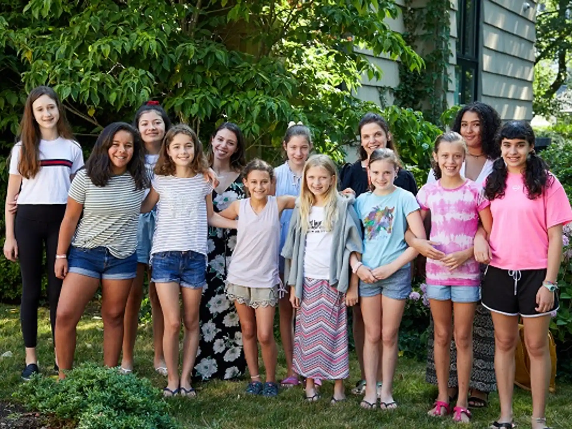 a group of girls posing for a photo