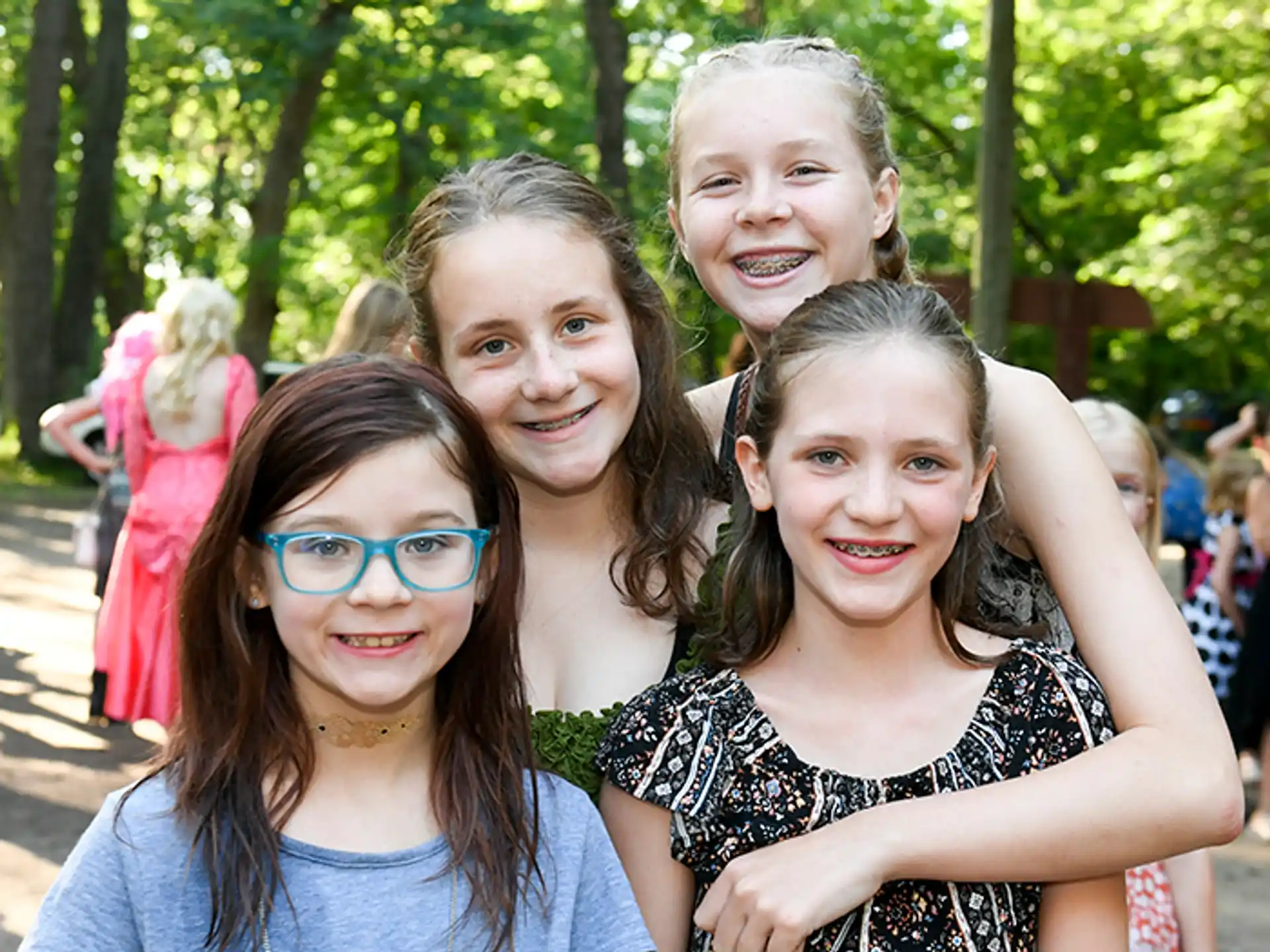 a group of girls posing for a photo