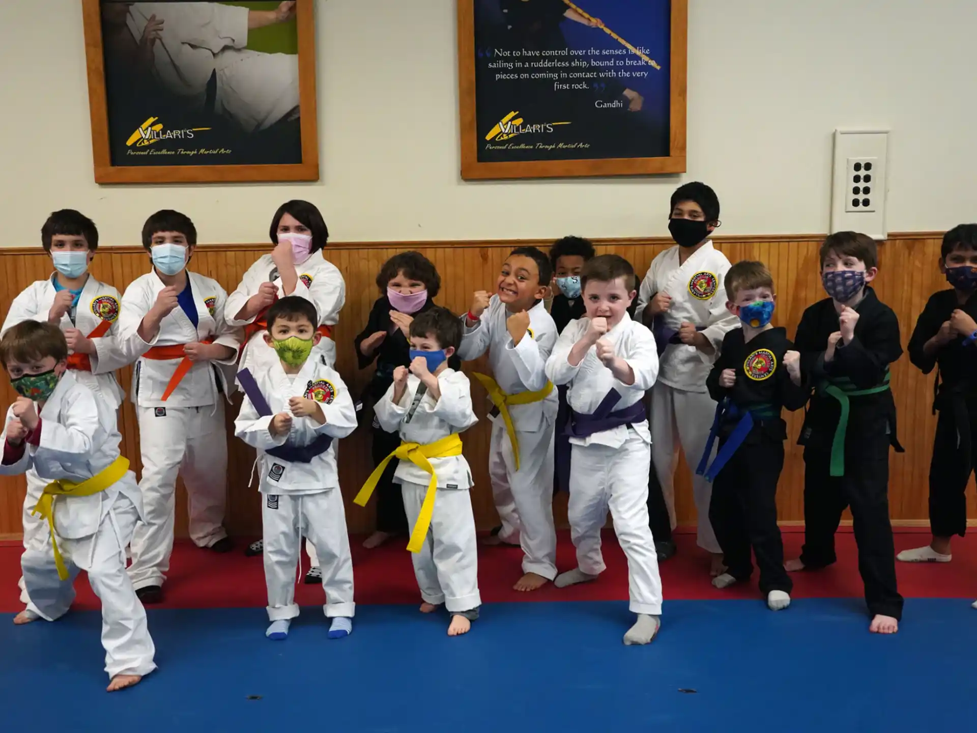 a group of people in karate uniforms