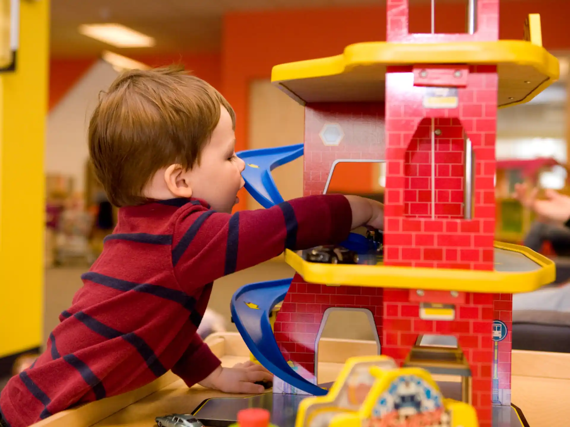 a child playing with a toy