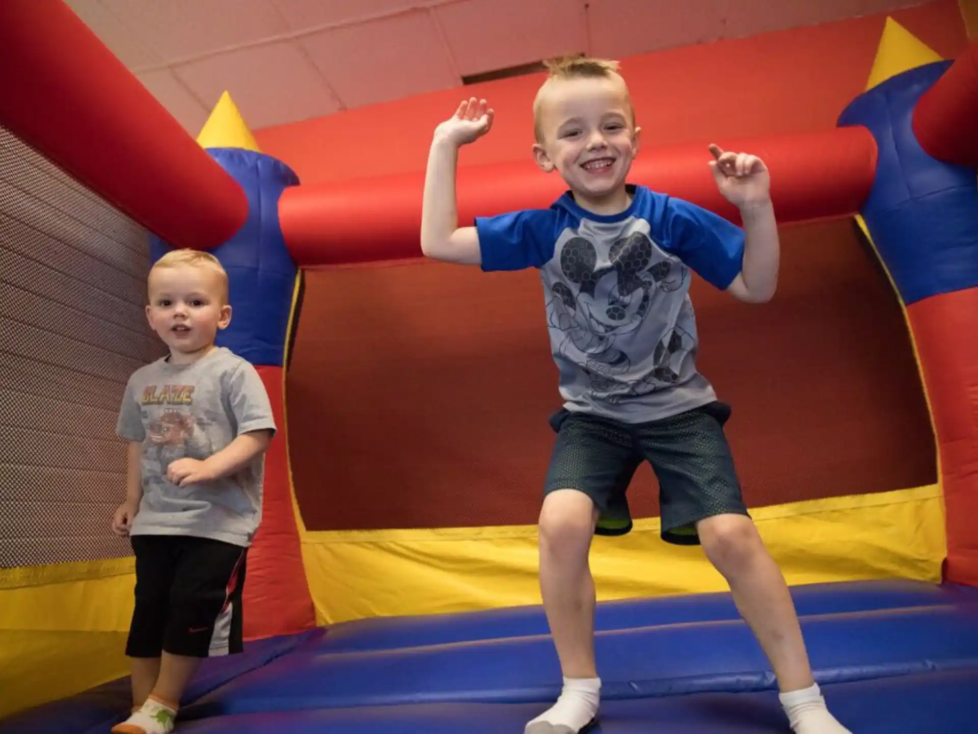 a couple of kids in a play area