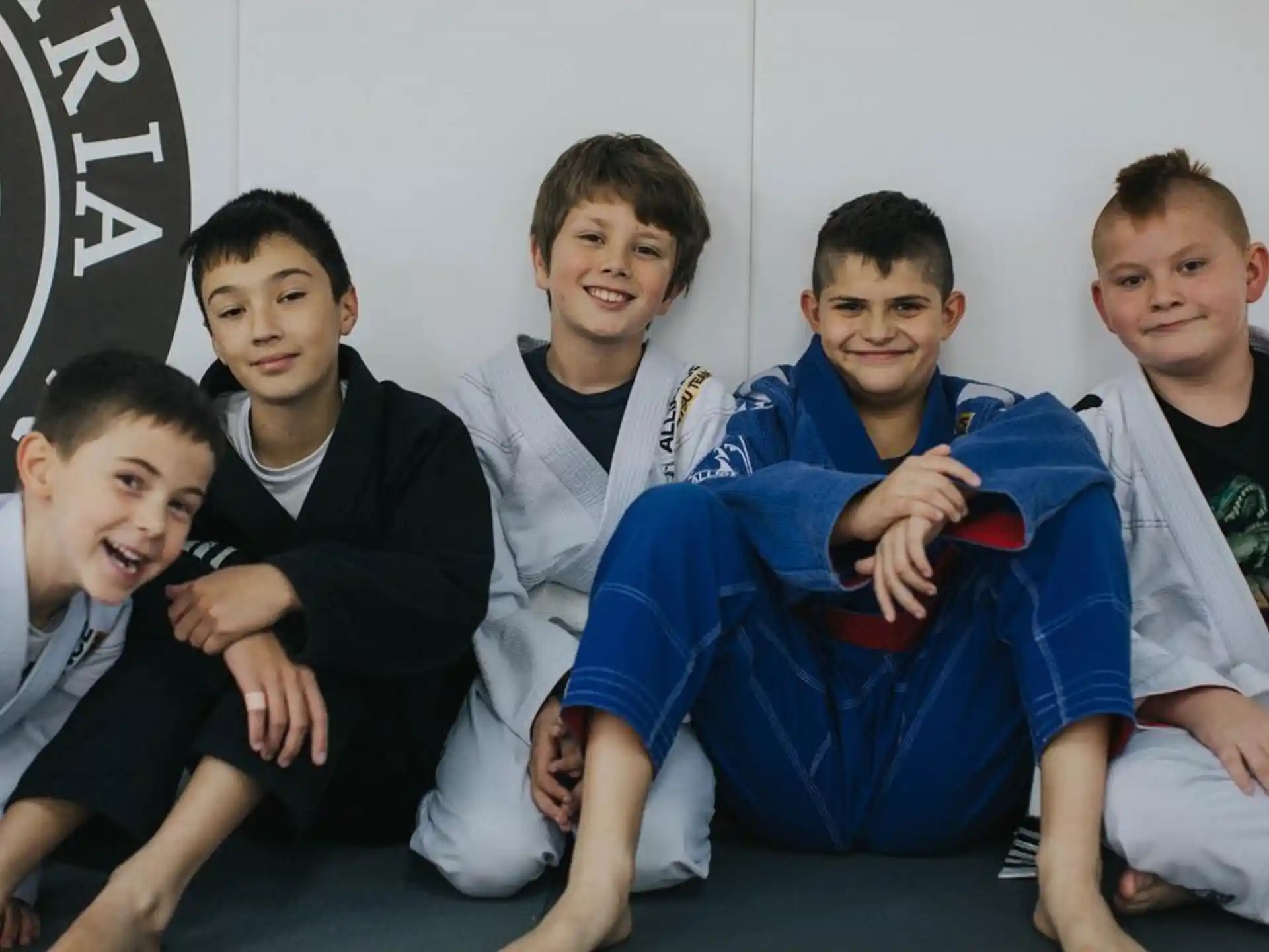 a group of boys posing for a picture
