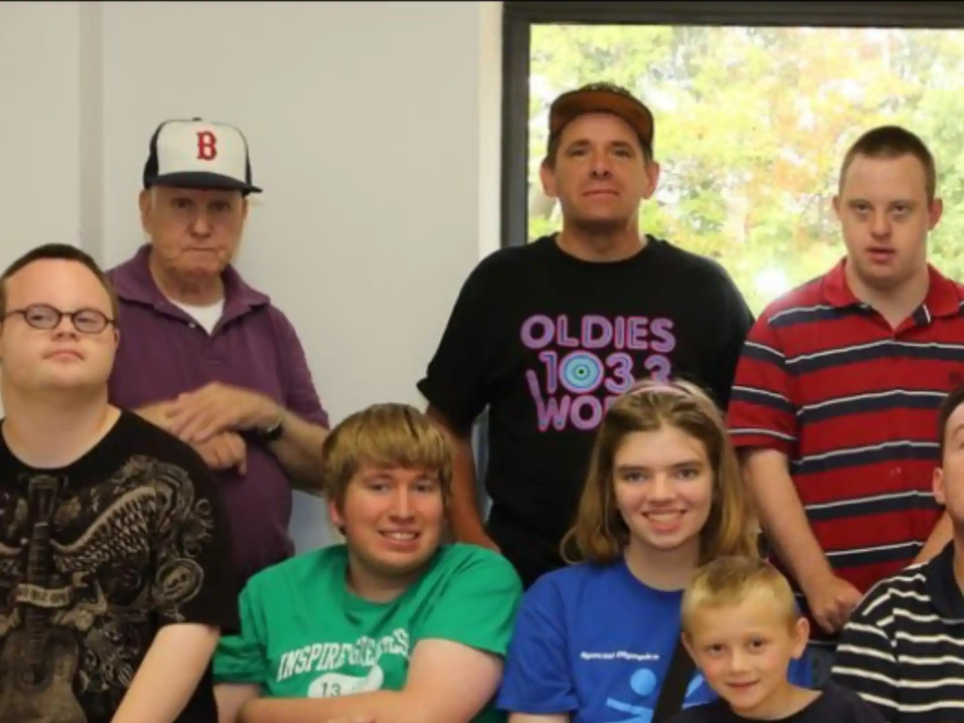 a group of people posing for a photo